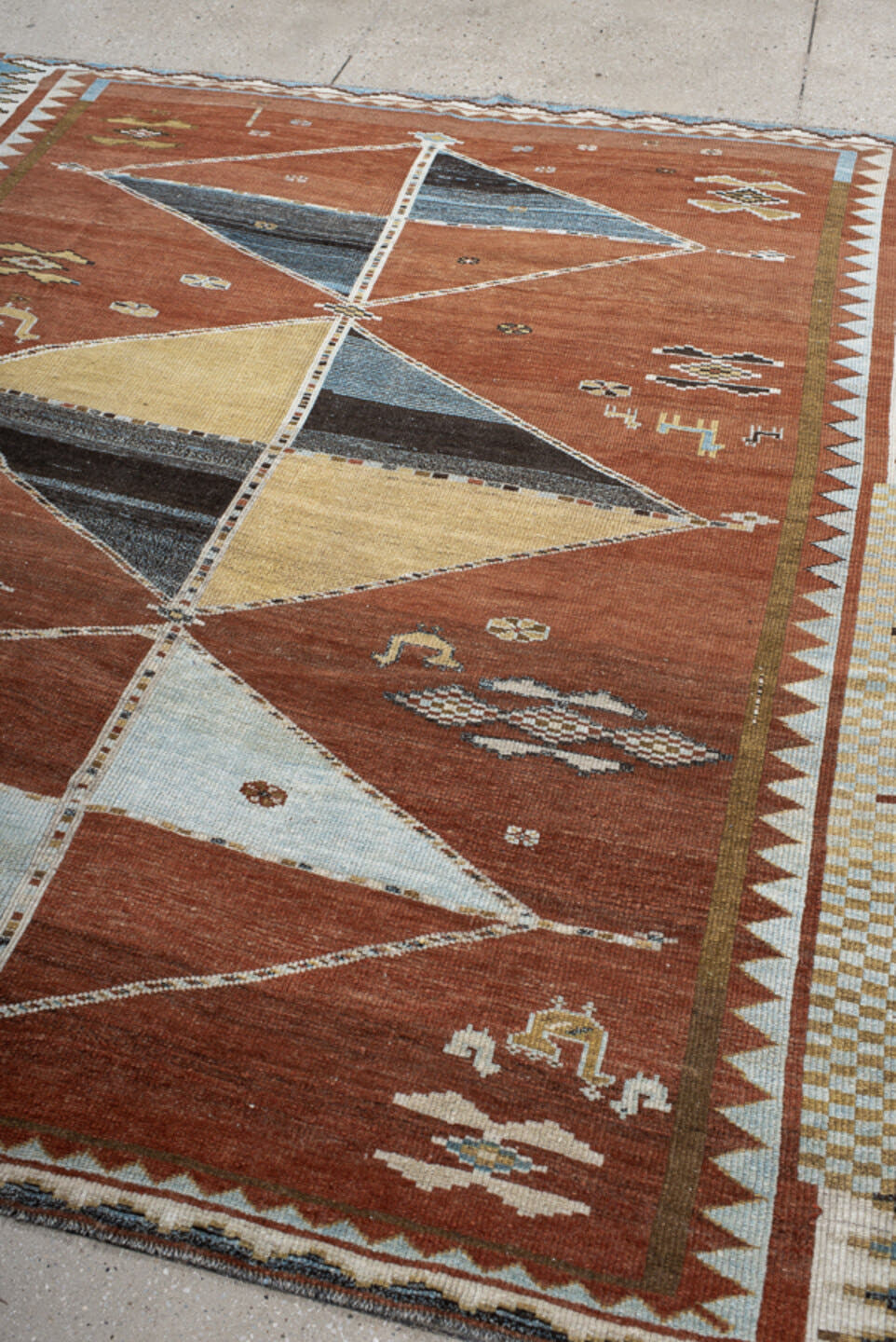 6' x 7' one-of-a-kind handmade vintage Gabbe rug. Color palette: rust, ivory, sky_blue, camel, charcoal, slate, olive