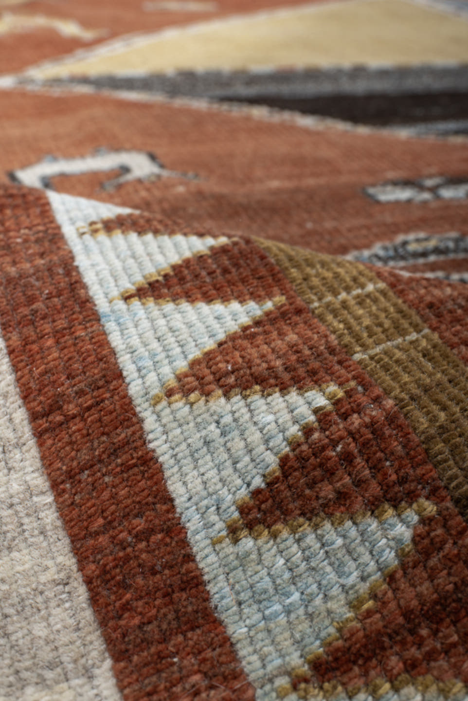 6' x 7' one-of-a-kind handmade vintage Gabbe rug. Color palette: rust, ivory, sky_blue, camel, charcoal, slate, olive