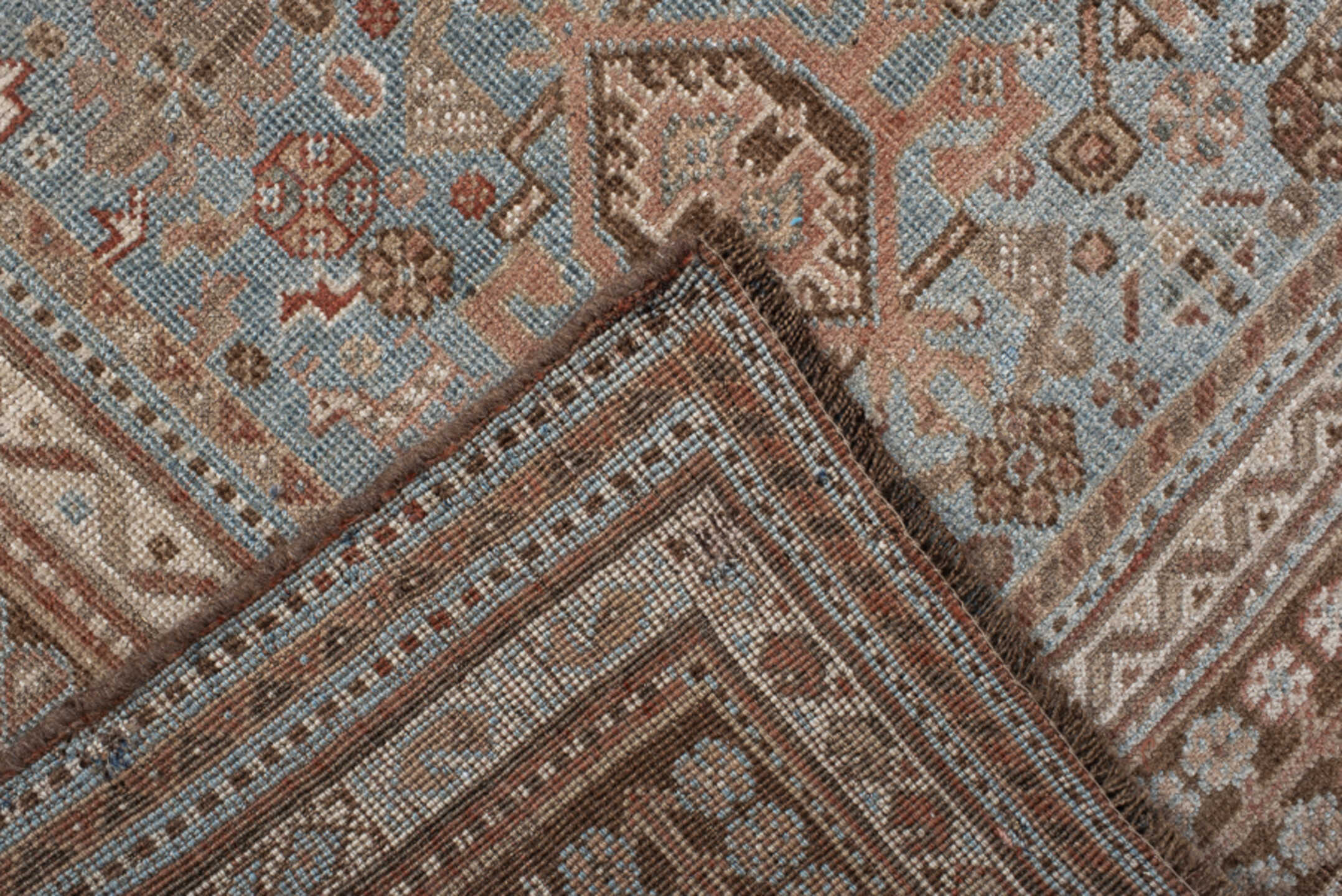 5' x 8' one-of-a-kind handmade vintage Shiraz medium size rug. Color palette: terra cotta, powder blue, ivory, brown, taupe