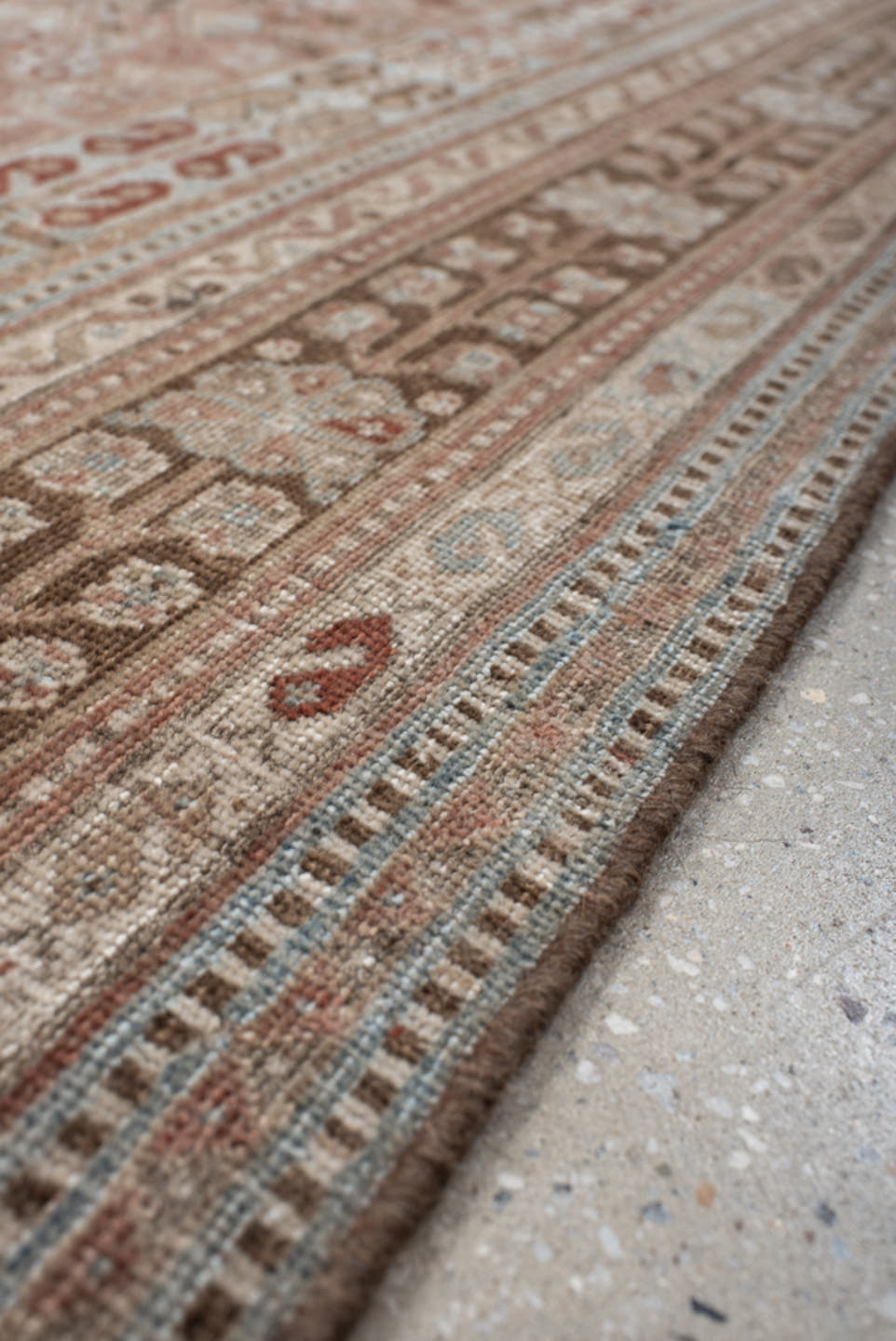 5' x 8' one-of-a-kind handmade vintage Shiraz medium size rug. Color palette: terra cotta, powder blue, ivory, brown, taupe