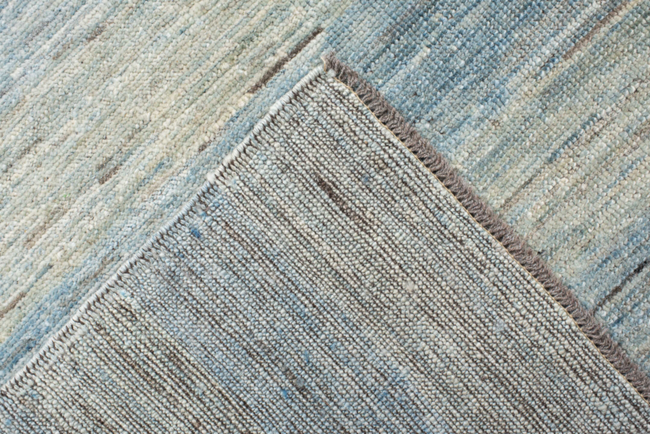 10' x 12' one-of-a-kind handmade vintage Gabbe large size rug. Color palette: ivory, pale blue, sky blue, beige, taupe