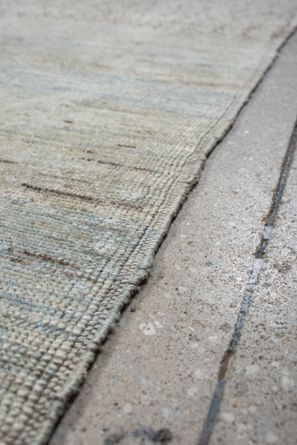 10' x 12' one-of-a-kind handmade vintage Gabbe large size rug. Color palette: ivory, pale blue, sky blue, beige, taupe