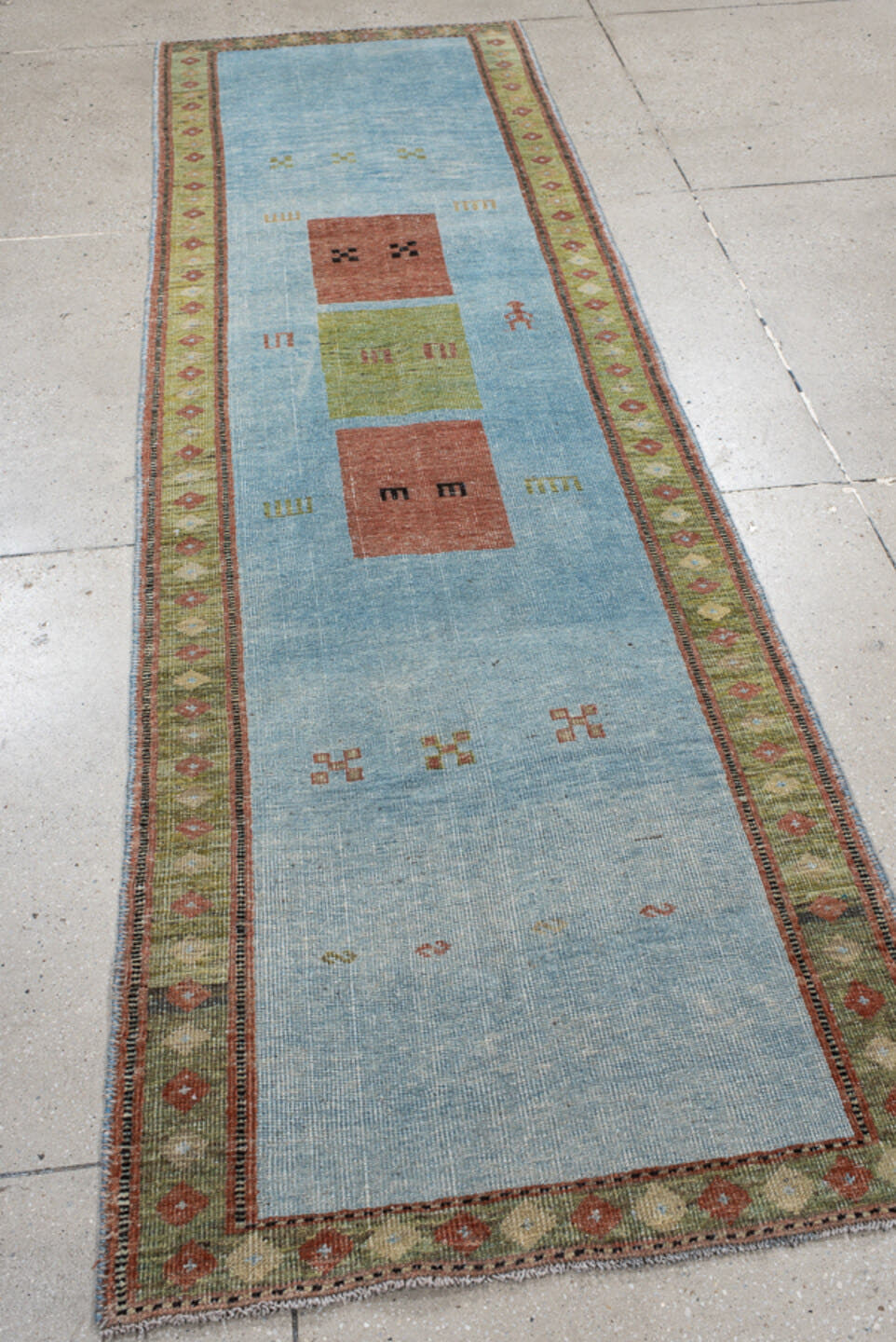 3' x 9' one-of-a-kind handmade vintage Gabbe runner rug. Color palette: sky blue, sage, rust, olive, ivory, charcoal, rose