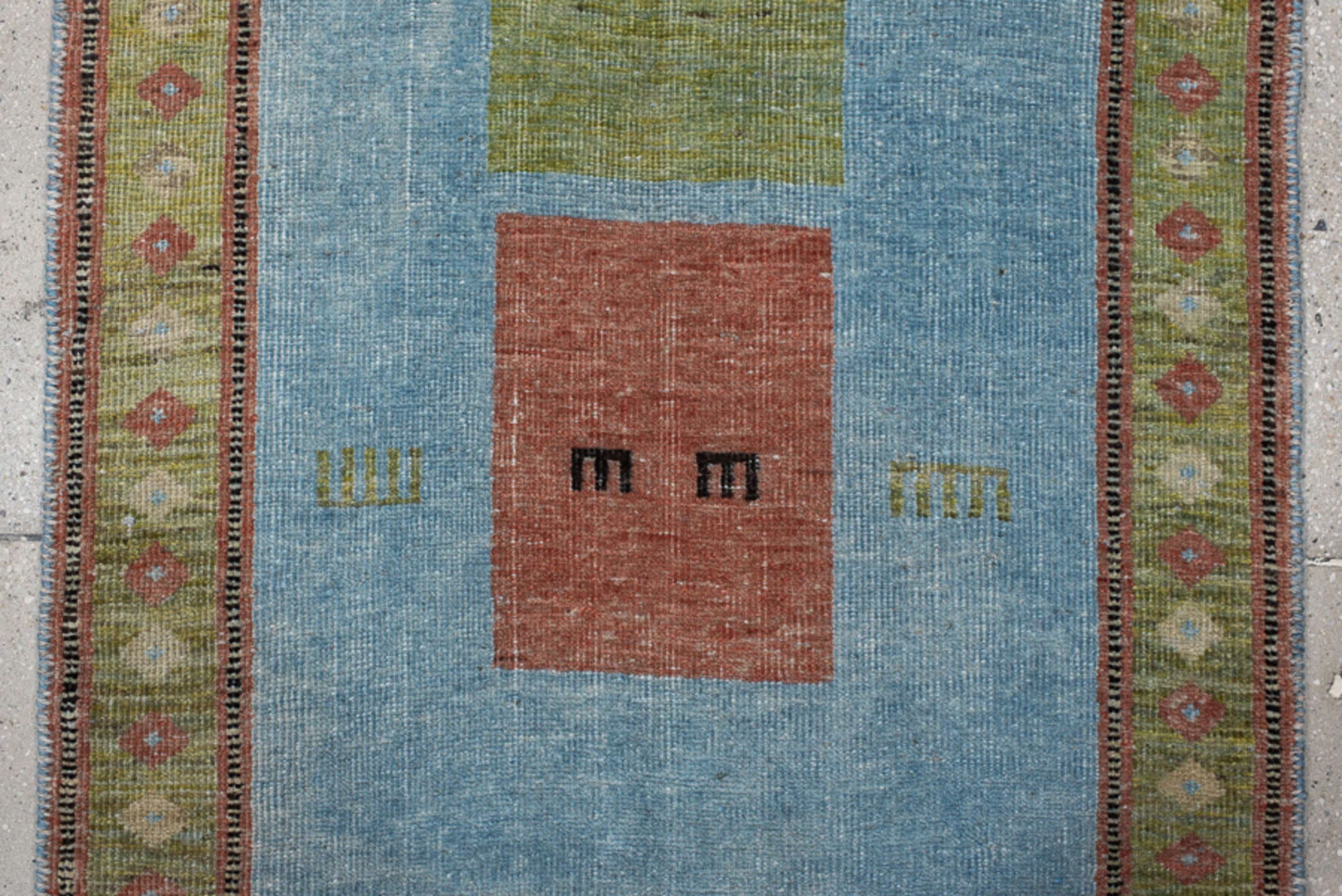 3' x 9' one-of-a-kind handmade vintage Gabbe runner rug. Color palette: sky blue, sage, rust, olive, ivory, charcoal, rose