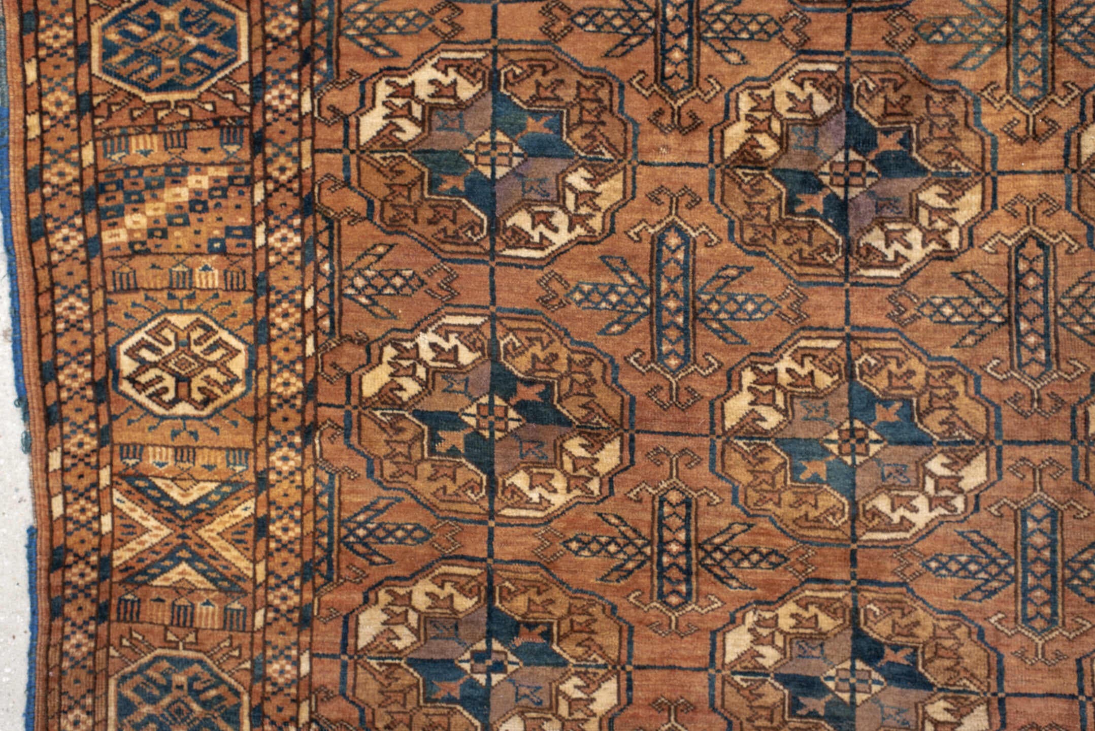 6' x 10' one-of-a-kind handmade antique Torkaman large size rug. Color palette: terra cotta, brown, navy, ivory, camel
