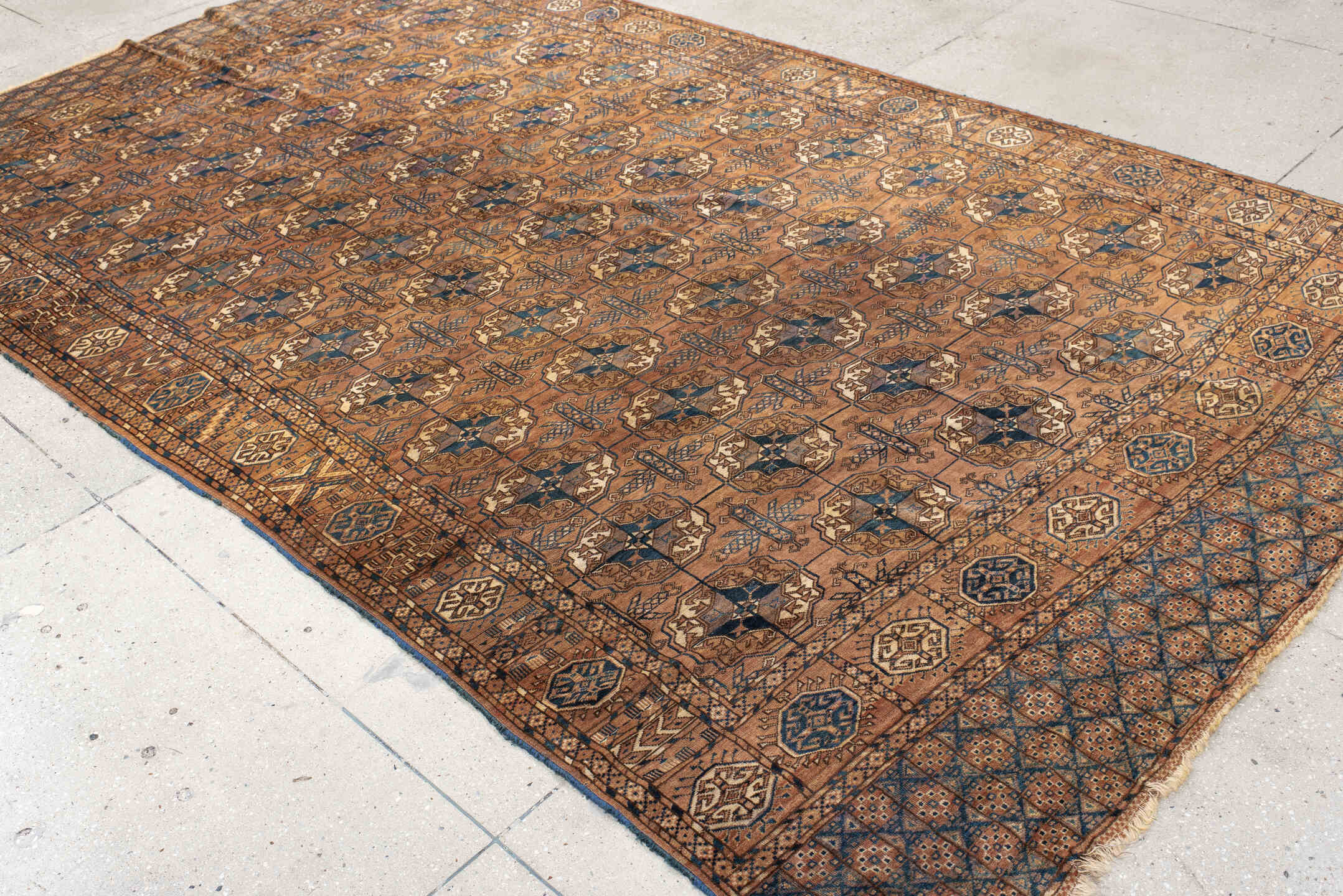 6' x 10' one-of-a-kind handmade antique Torkaman large size rug. Color palette: terra cotta, brown, navy, ivory, camel
