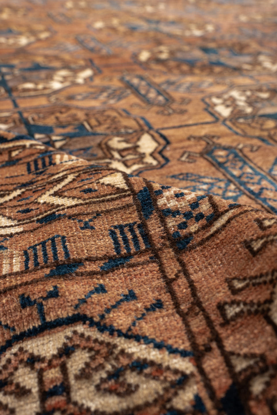 6' x 10' one-of-a-kind handmade antique Torkaman large size rug. Color palette: terra cotta, brown, navy, ivory, camel