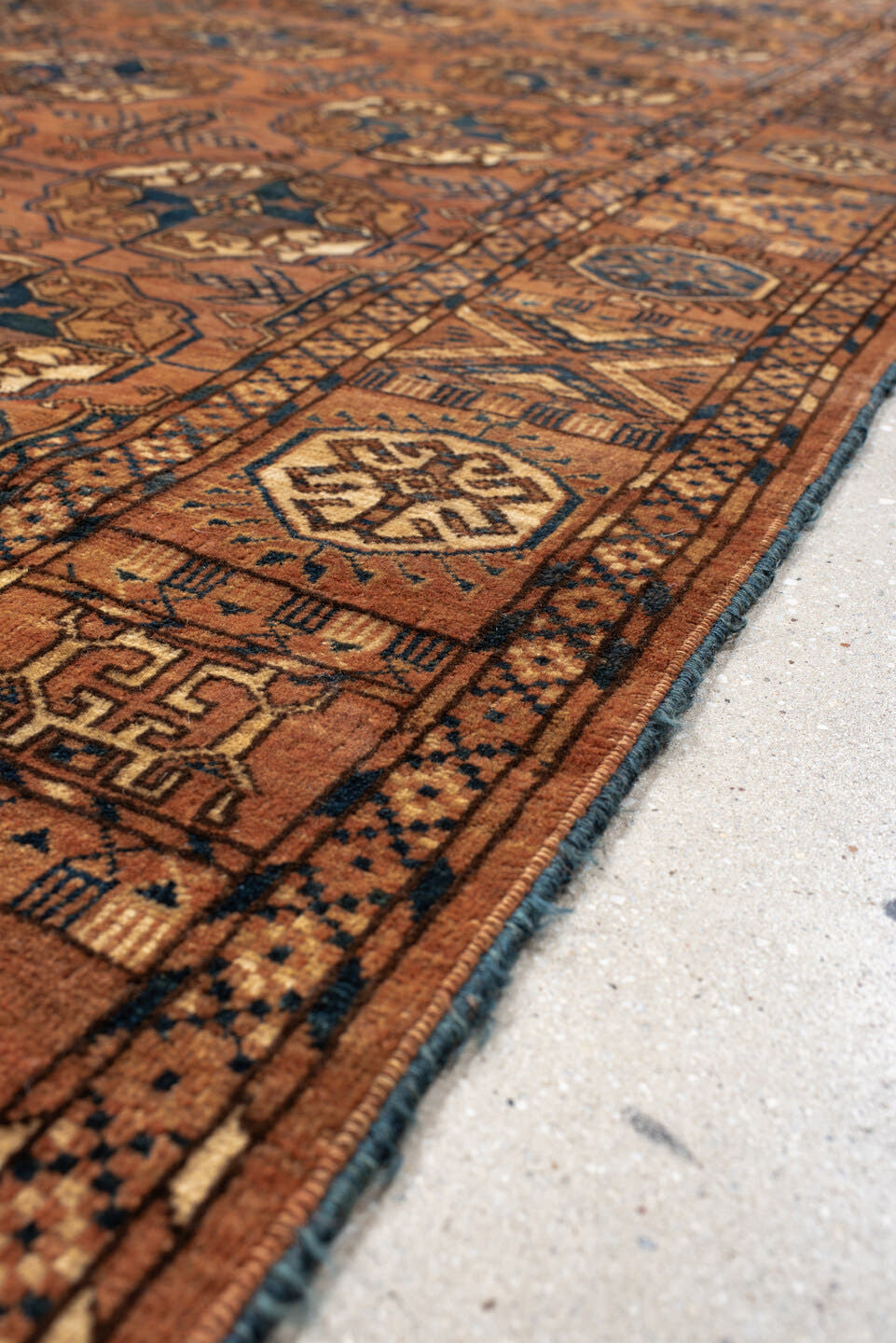 6' x 10' one-of-a-kind handmade antique Torkaman large size rug. Color palette: terra cotta, brown, navy, ivory, camel