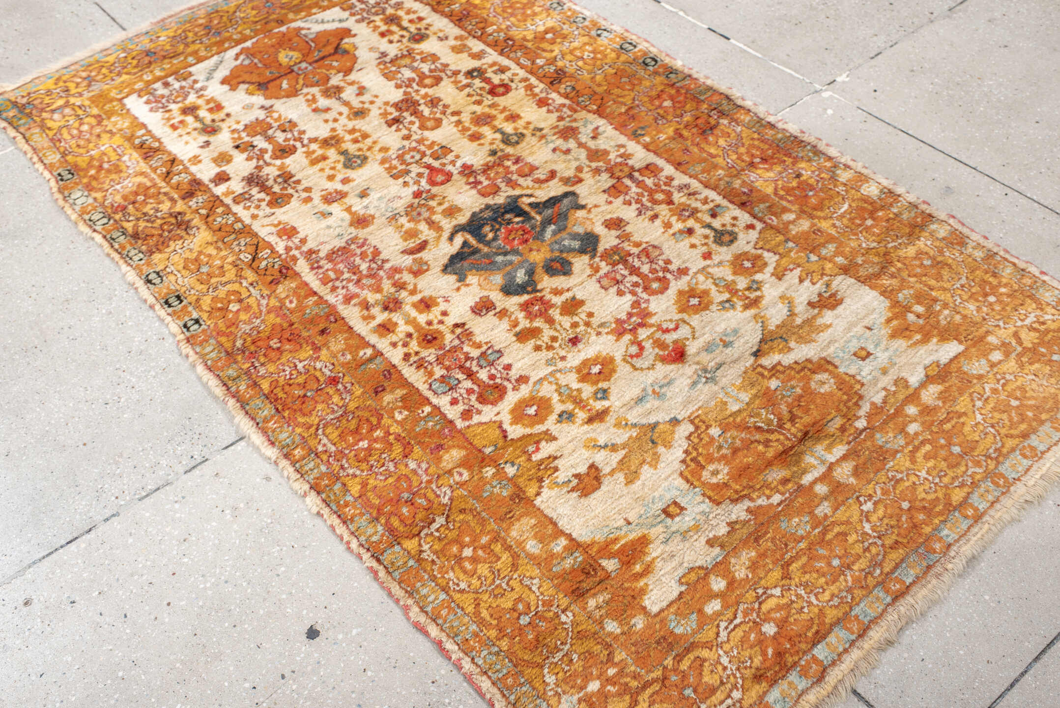 3' x 6' one-of-a-kind handmade antique Oushak rug. Color palette: apricot, ivory, rust, sky blue, slate, camel, terracotta