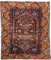 4' x 5' one-of-a-kind handmade vintage Anatolian small size rug. Color palette: rust, indigo, ivory, burgundy, sky blue