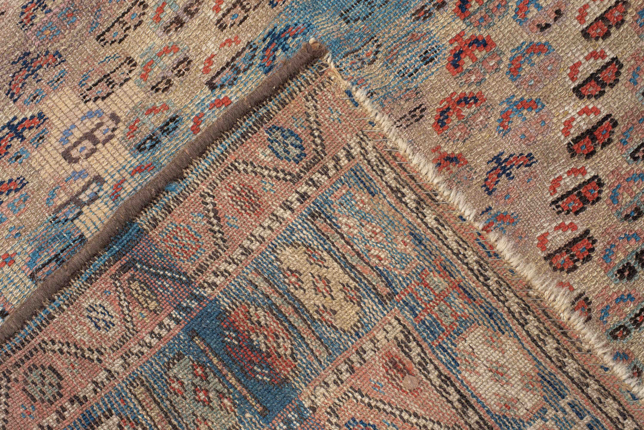 4' x 6' one-of-a-kind handmade vintage Kurd small size rug. Color palette: ivory, indigo, rose, rust, sky blue, charcoal