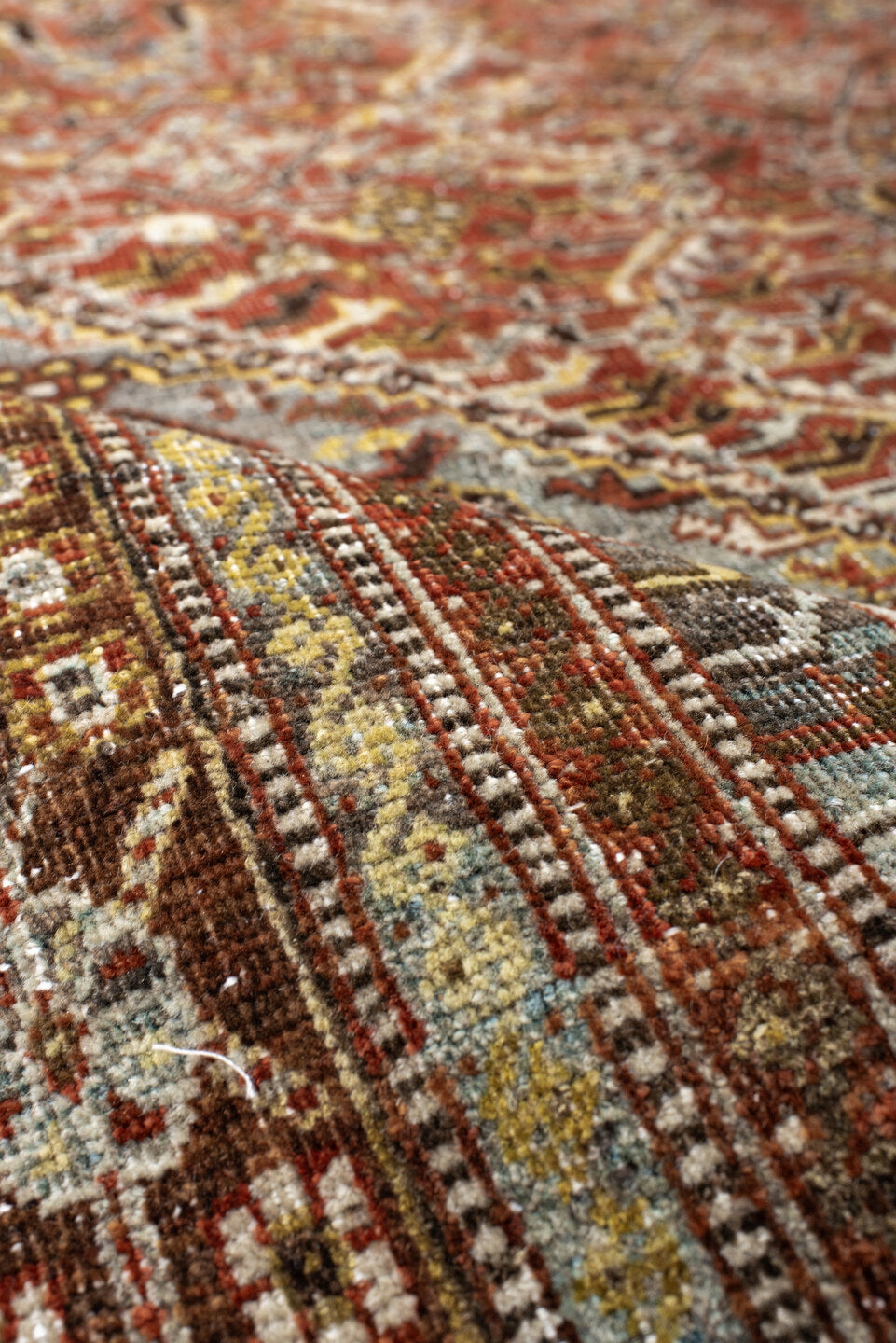 6' x 9' one-of-a-kind handmade vintage Qashqai medium size rug. Color palette: rust, light blue, ivory, brown, charcoal