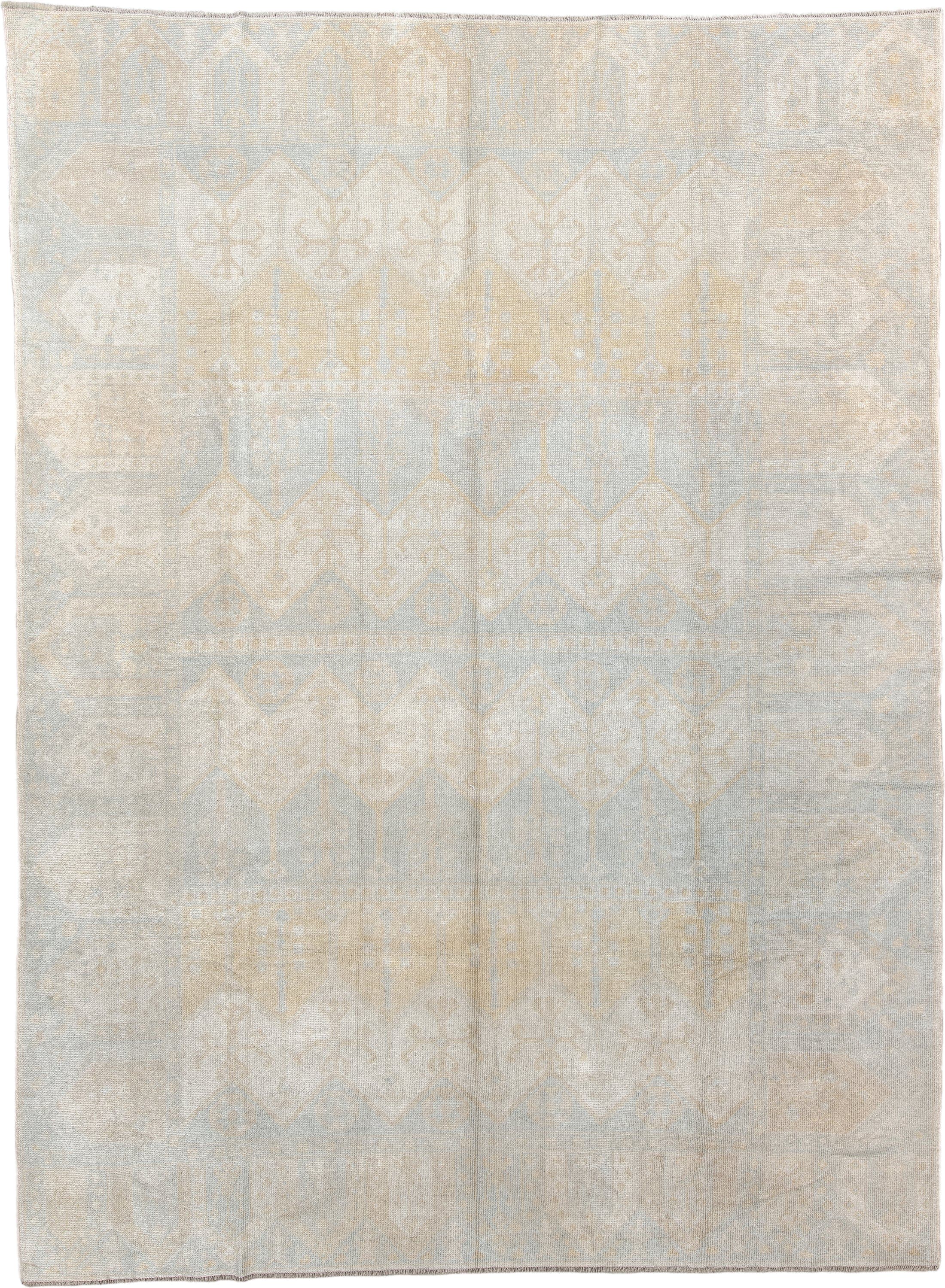 9' x 12' one-of-a-kind handmade vintage  large size rug. Color palette: ivory, pale blue, cream, beige, taupe, light blue