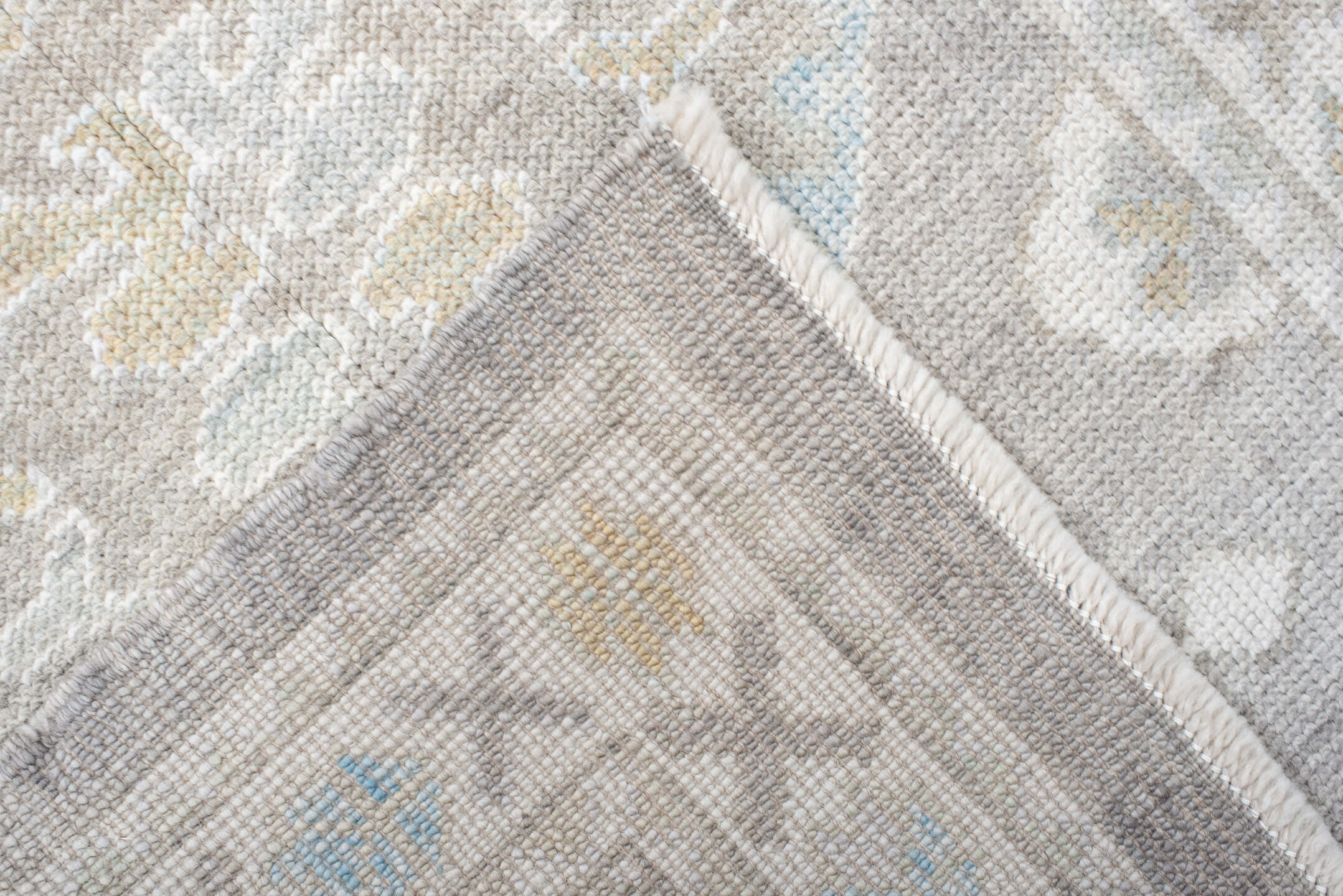 3' x 10' one-of-a-kind handmade vintage  runner rug. Color palette: dark gray, gainsboro, gray, light blue, light gray