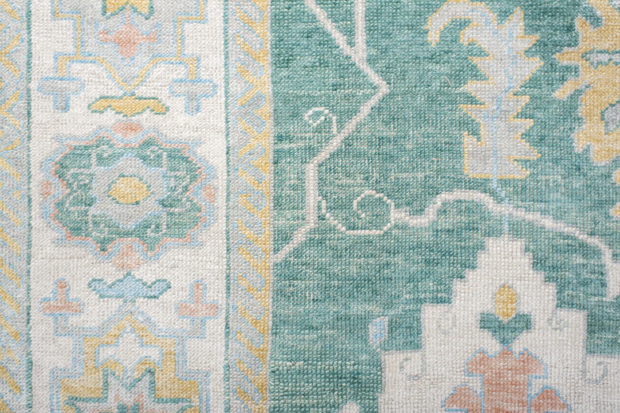 8' x 9' one-of-a-kind handmade vintage Oushak rug. Color palette: seafoam, ivory, pale gold, blush, powder blue, sage, teal