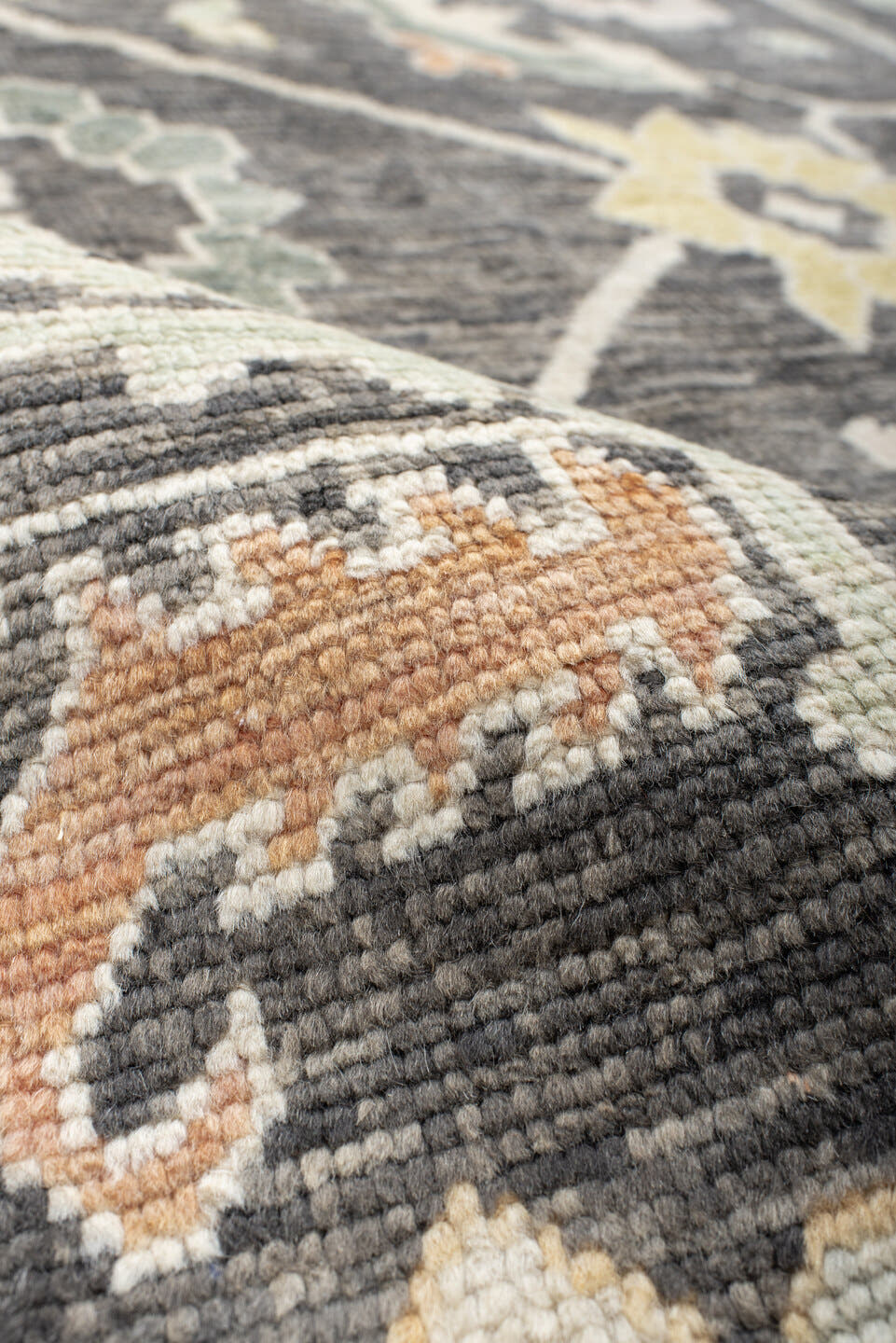 9' x 15' one-of-a-kind handmade vintage Oushak rug. Color palette: charcoal, ivory, sage, gold, peach, taupe, gray, black