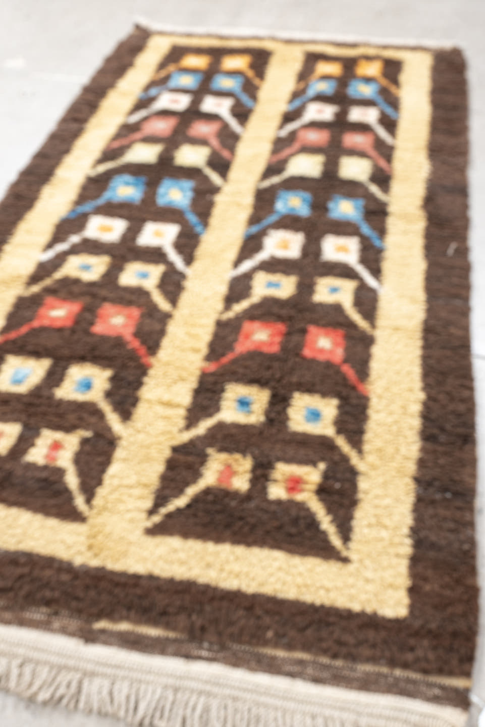 3' x 6' one-of-a-kind handmade vintage Tulu rug. Color palette: brown, ivory, sky_blue, coral, saffron, cream, light blue