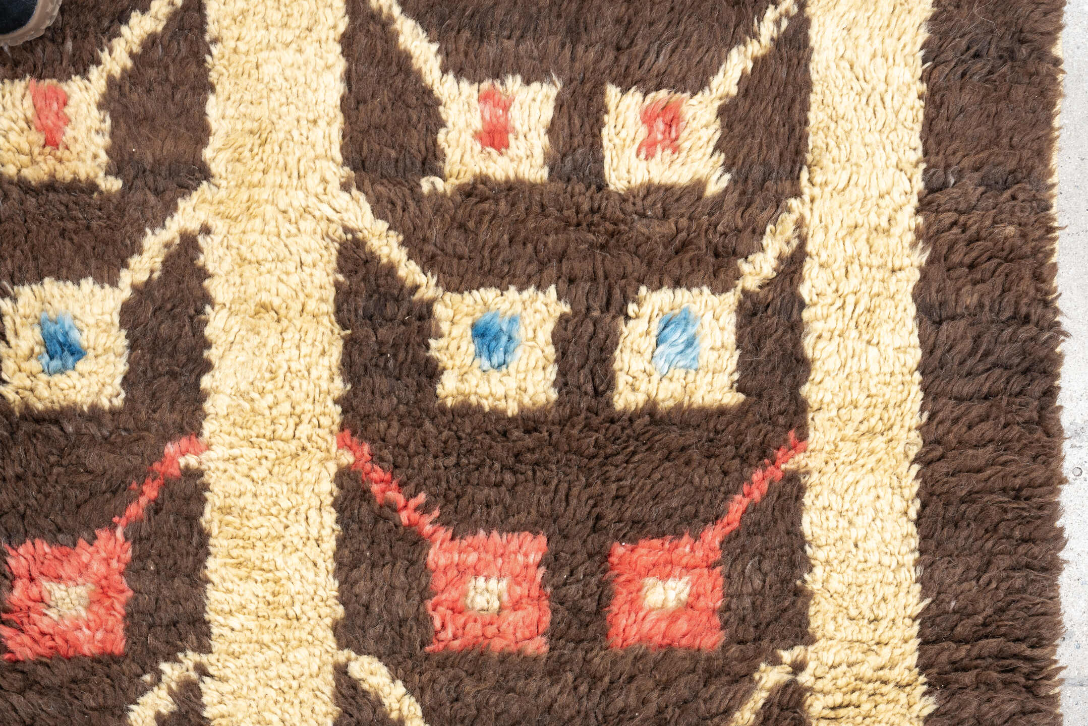 3' x 6' one-of-a-kind handmade vintage Tulu rug. Color palette: brown, ivory, sky_blue, coral, saffron, cream, light blue