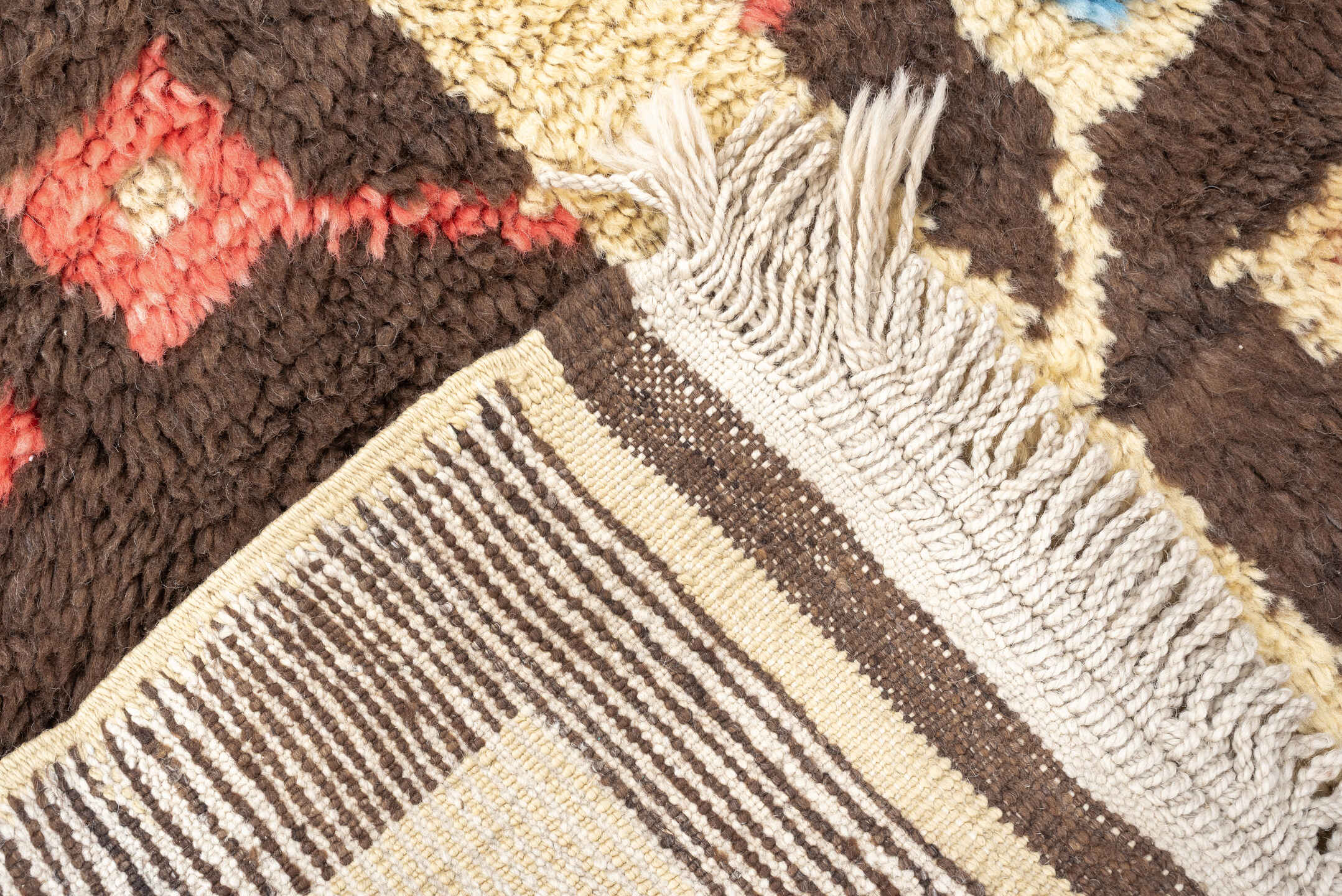 3' x 6' one-of-a-kind handmade vintage Tulu rug. Color palette: brown, ivory, sky_blue, coral, saffron, cream, light blue