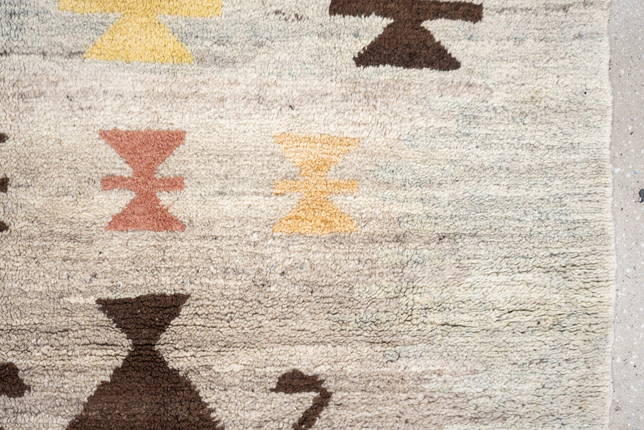 4' x 6' one-of-a-kind handmade vintage Moroccan rug. Color palette: ivory, brown, taupe, coral, gold, charcoal, peach, beige