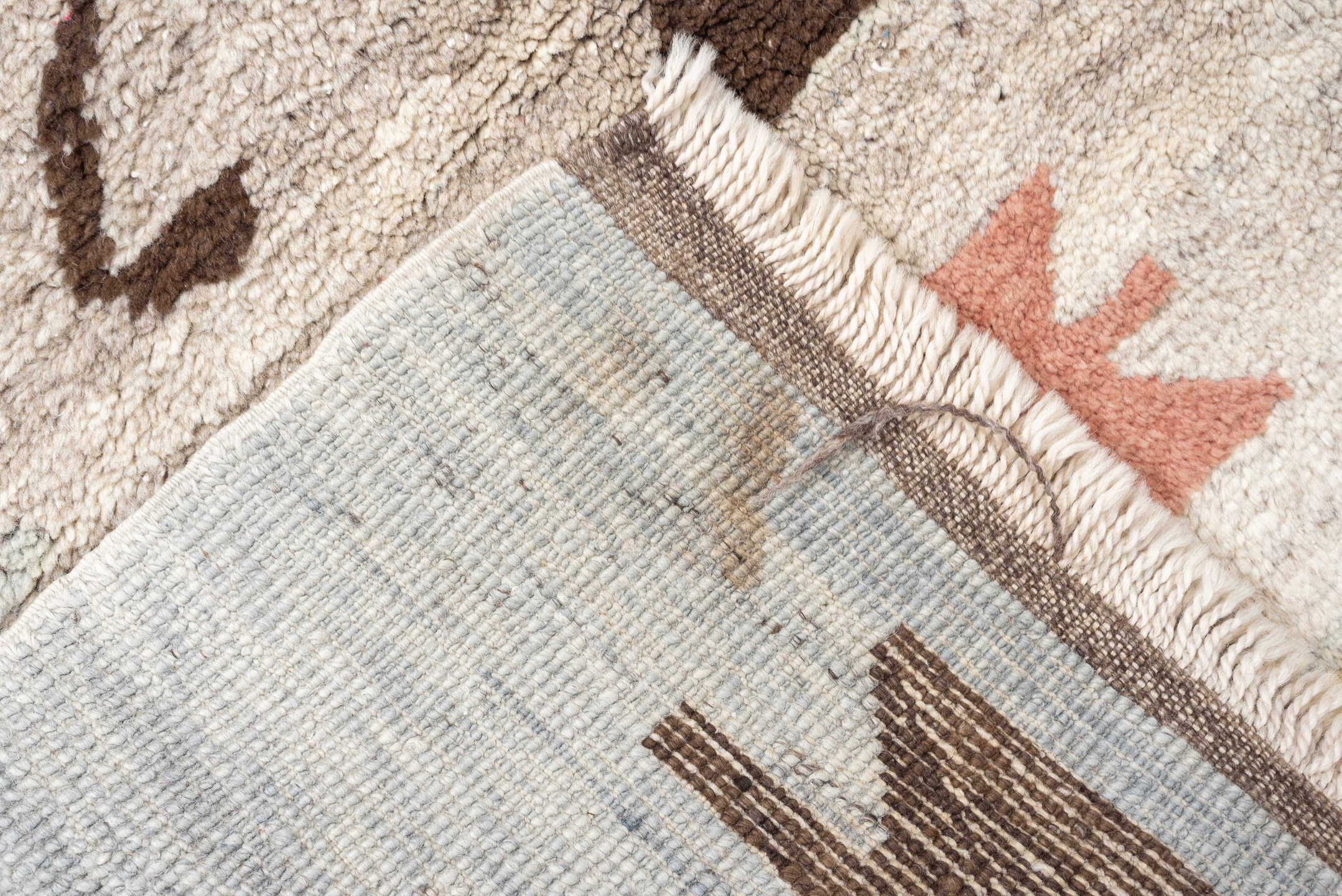 4' x 6' one-of-a-kind handmade vintage Moroccan rug. Color palette: ivory, brown, taupe, coral, gold, charcoal, peach, beige