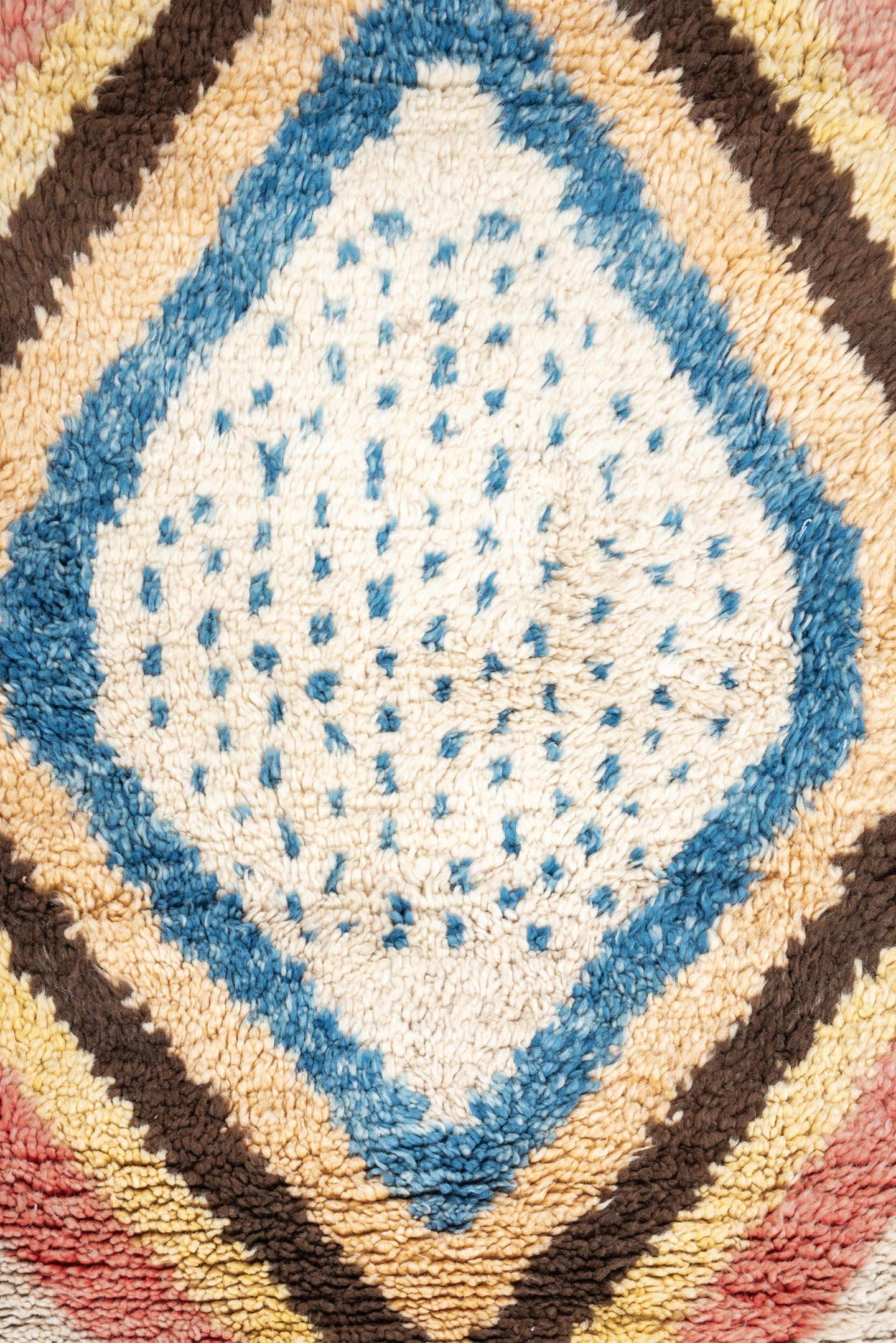 4' x 6' one-of-a-kind handmade vintage Moroccan small size rug. Color palette: ivory, rose, brown, blue, gold, peach, taupe