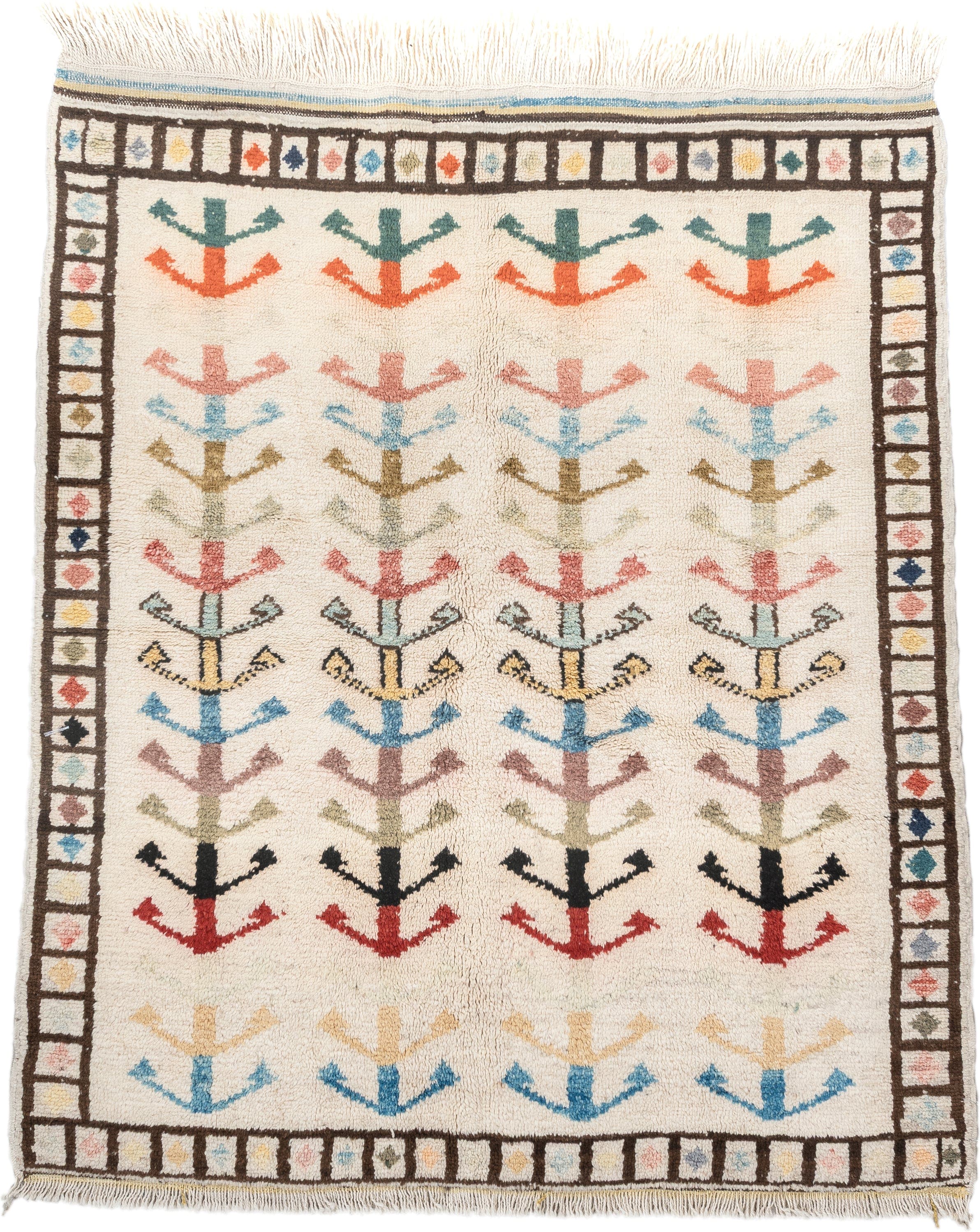 5' x 7' one-of-a-kind handmade vintage Tulu rug. Color palette: ivory, brown, sky blue, coral, blush, mustard, black, sage