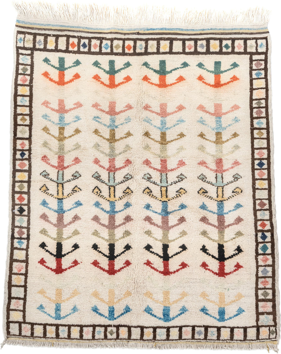 5' x 7' one-of-a-kind handmade vintage Tulu rug. Color palette: ivory, brown, sky blue, coral, blush, mustard, black, sage