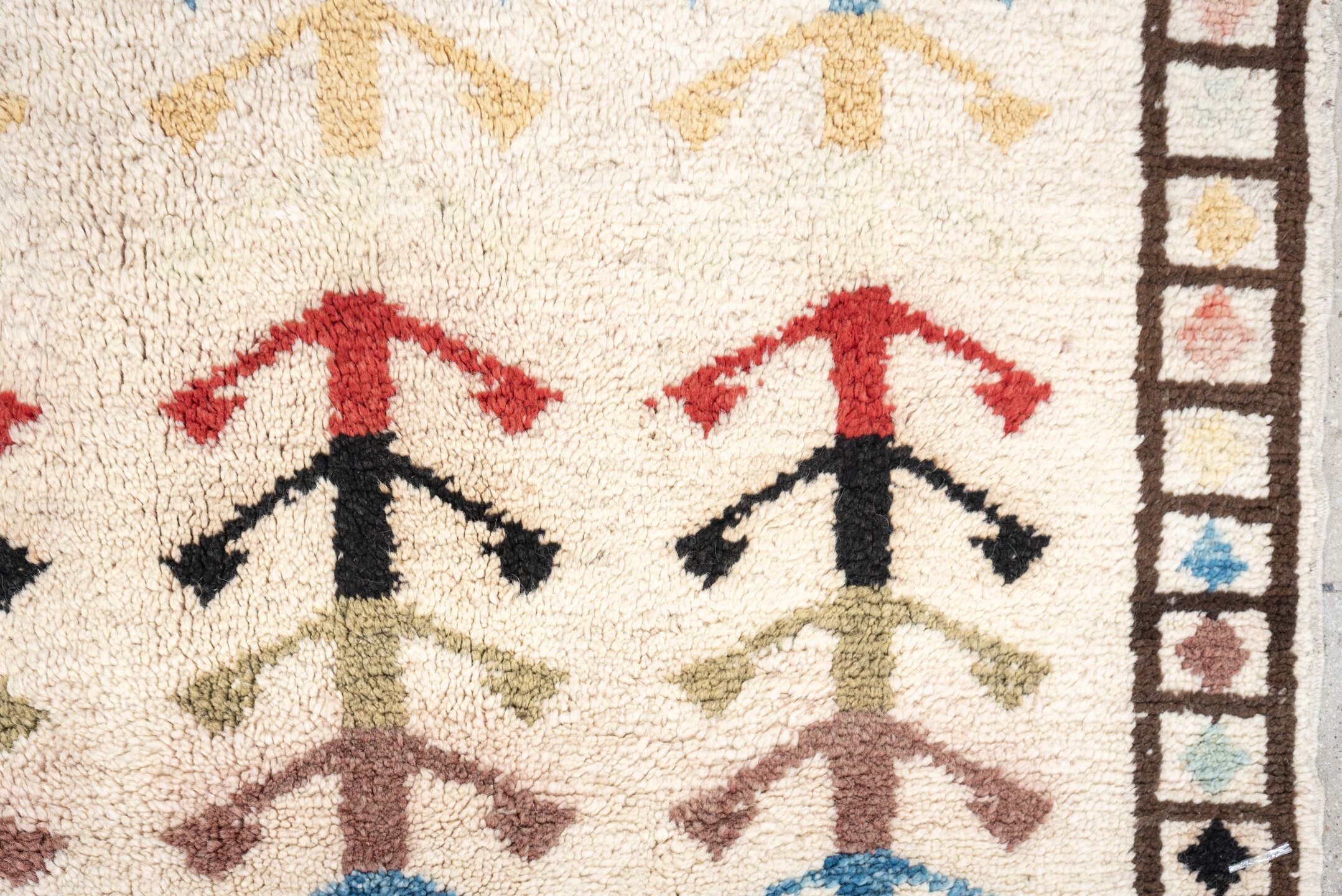 5' x 7' one-of-a-kind handmade vintage Tulu rug. Color palette: ivory, brown, sky blue, coral, blush, mustard, black, sage