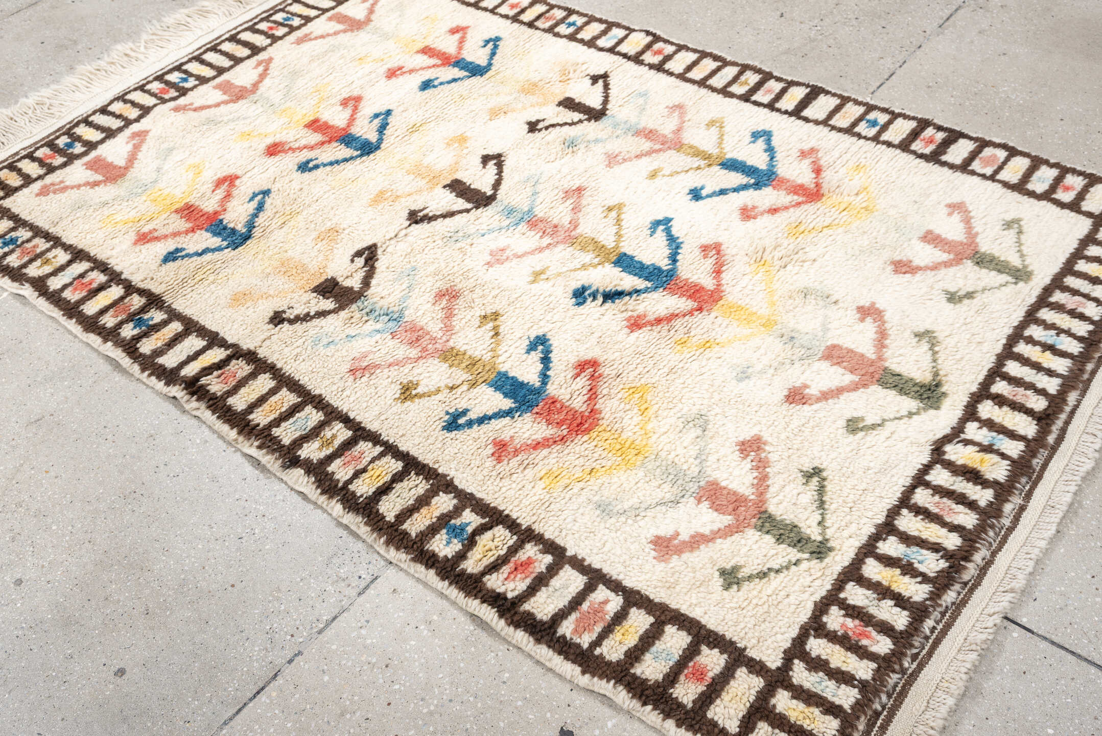 4' x 6' one-of-a-kind handmade vintage Moroccan small size rug. Color palette: ivory, brown, blue, coral, yellow, olive