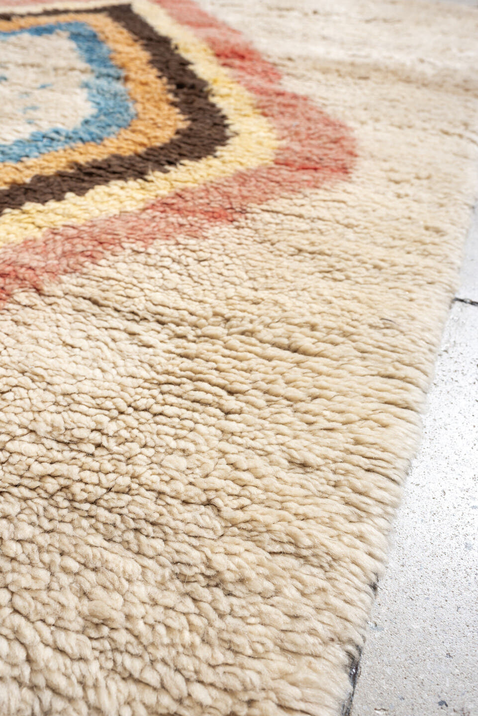 4' x 6' one-of-a-kind handmade vintage Tulu small size rug. Color palette: ivory, rose, brown, sky_blue, peach, gold, taupe