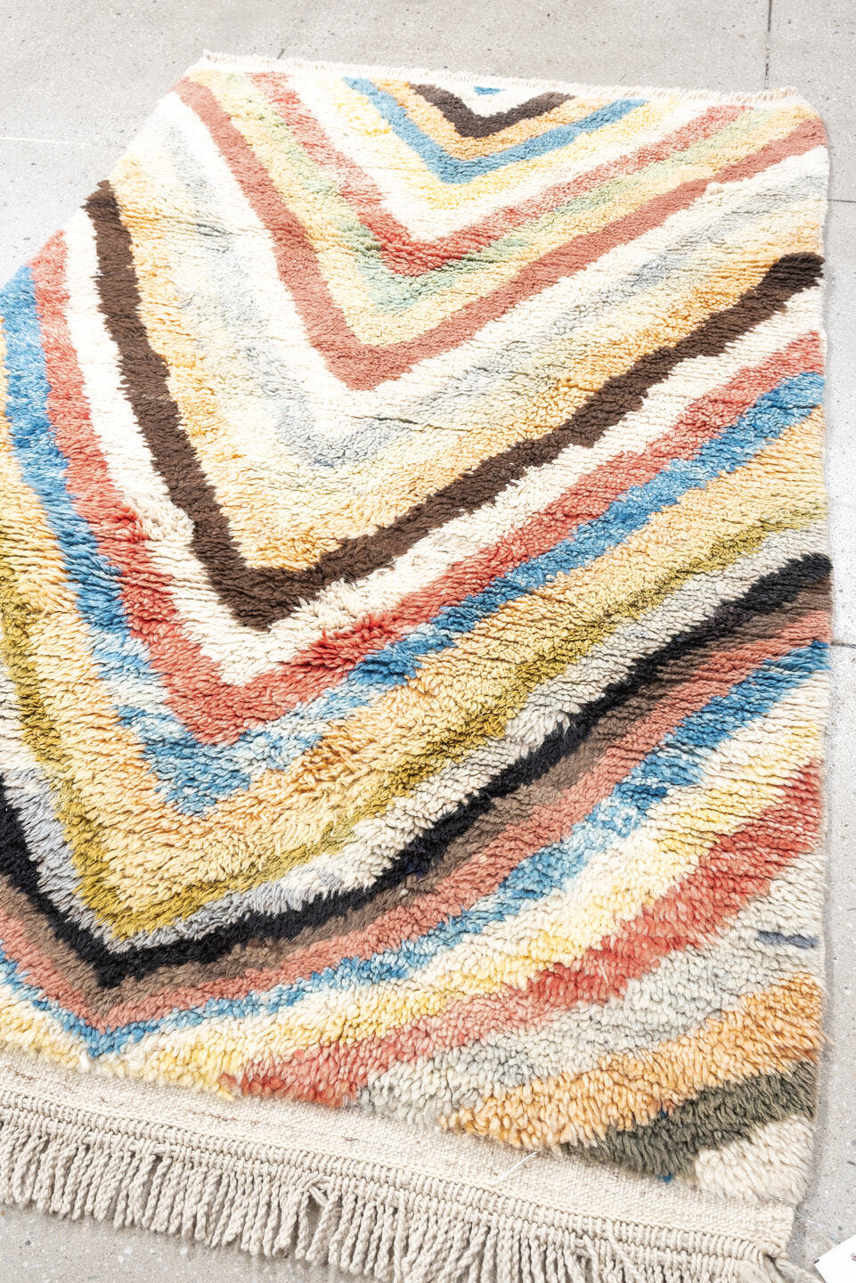4' x 6' one-of-a-kind handmade vintage Moroccan small size rug. Color palette: ivory, peach, sky_blue, blush, brown