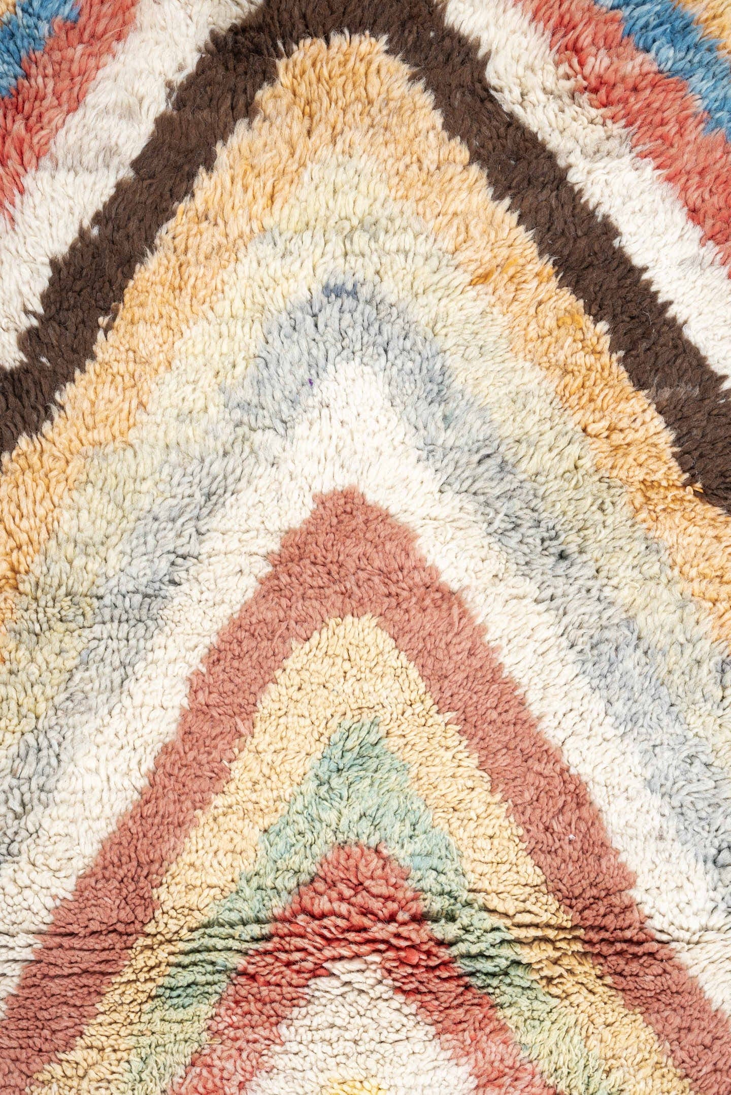 4' x 6' one-of-a-kind handmade vintage Moroccan small size rug. Color palette: ivory, peach, sky_blue, blush, brown