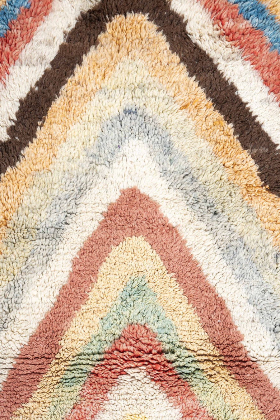 4' x 6' one-of-a-kind handmade vintage Moroccan small size rug. Color palette: ivory, peach, sky_blue, blush, brown