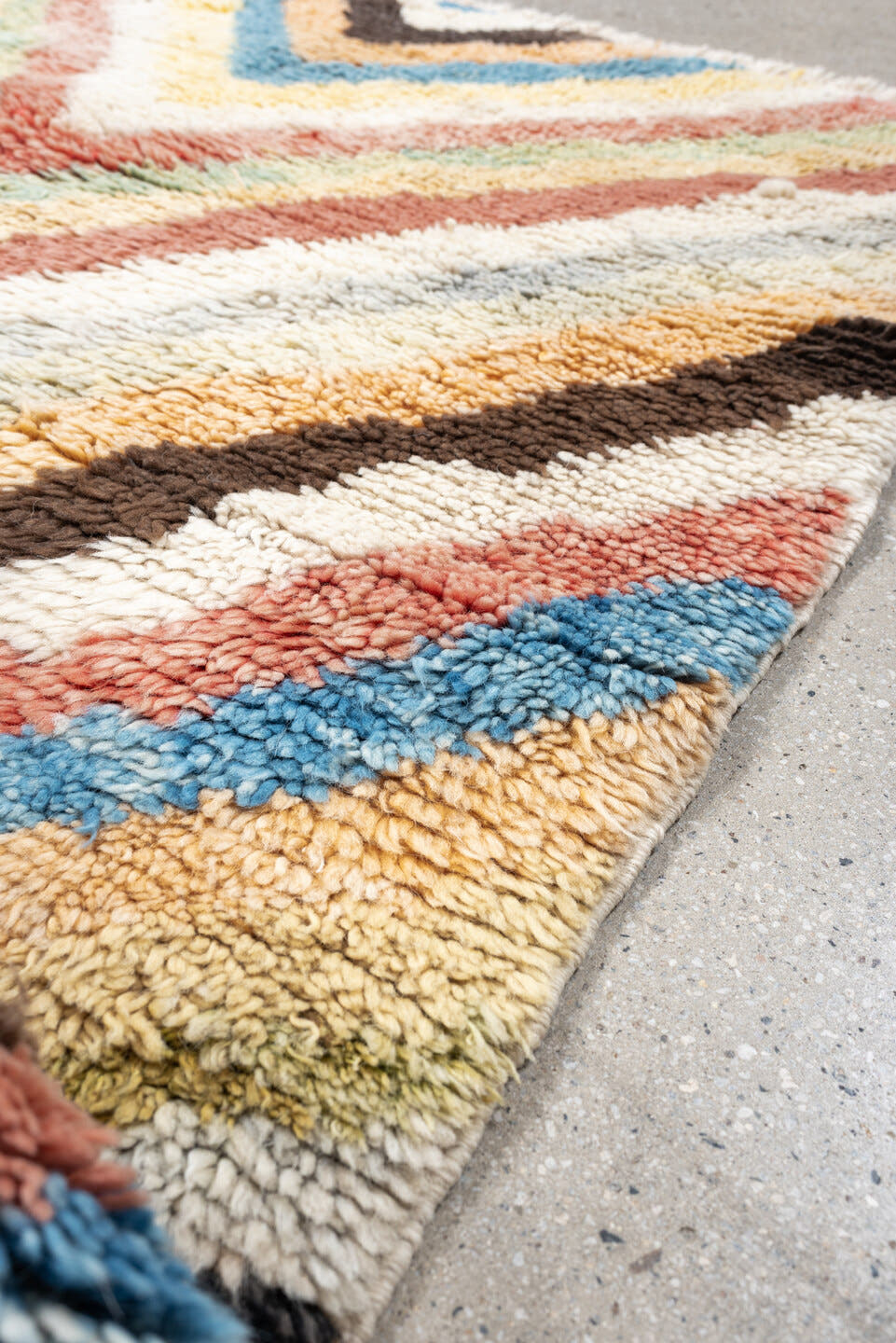 4' x 6' one-of-a-kind handmade vintage Moroccan small size rug. Color palette: ivory, peach, sky_blue, blush, brown