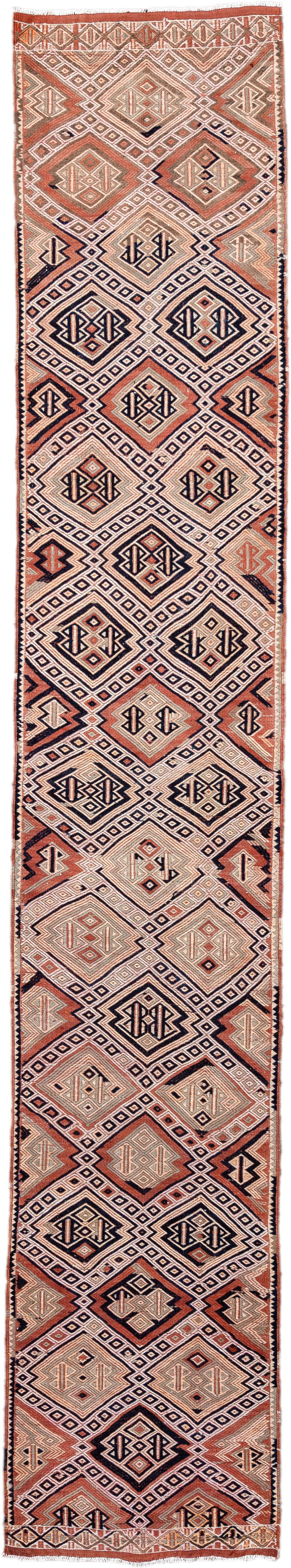 2' x 12' one-of-a-kind handmade vintage Jijim runner rug. Color palette: ivory, terra cotta, charcoal, rust, camel