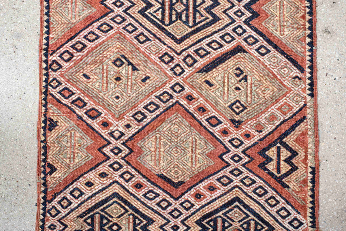 2' x 12' one-of-a-kind handmade vintage Jijim runner rug. Color palette: ivory, terra cotta, charcoal, rust, camel