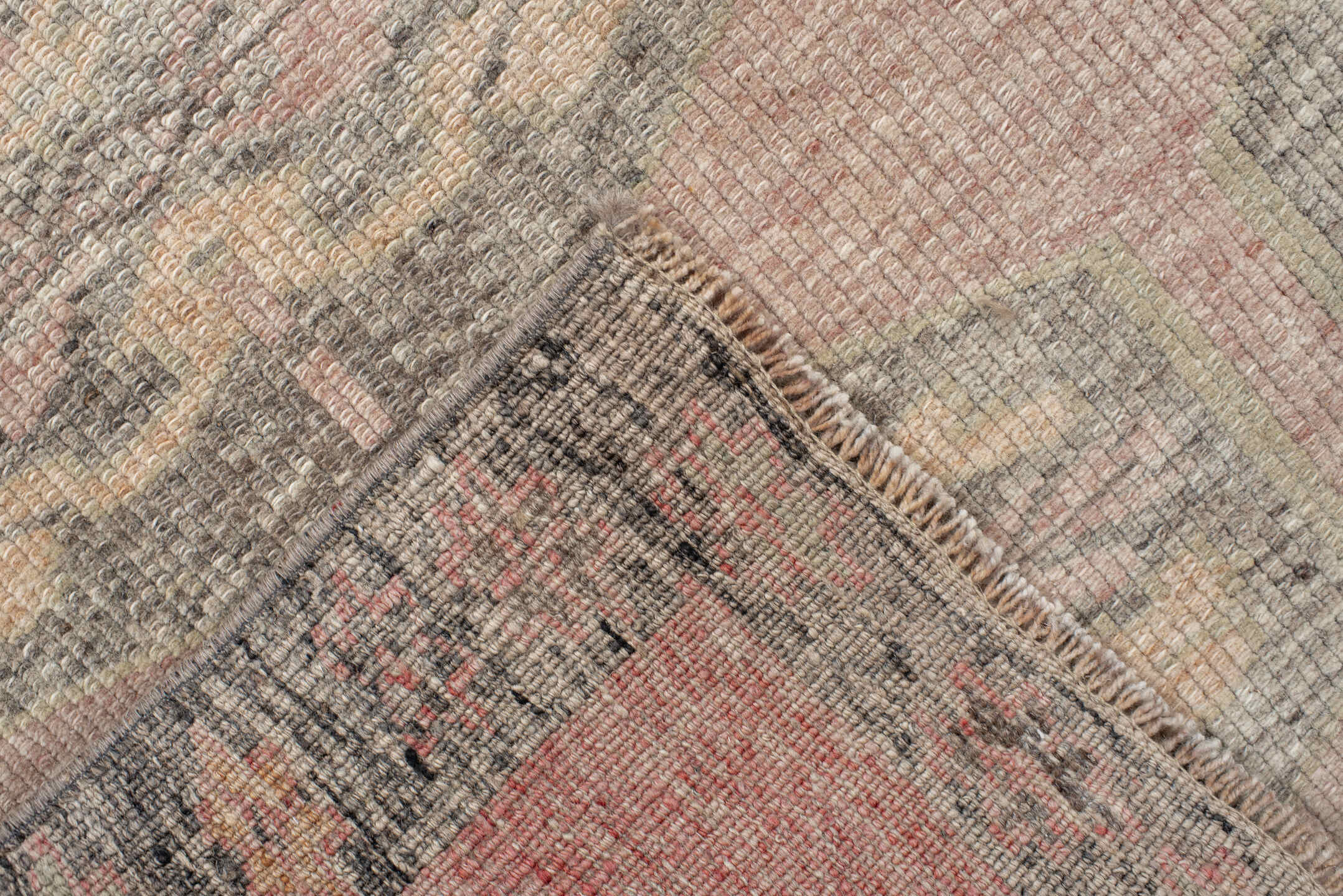 4' x 9' one-of-a-kind handmade vintage Kars runner rug. Color palette: brown, gray, light gray, off-white, orange, pink