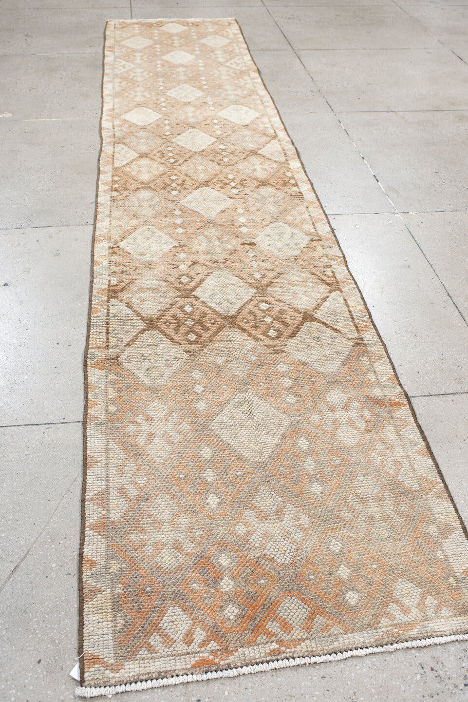 2' x 13' one-of-a-kind handmade vintage Kars runner rug. Color palette: ivory, taupe, blush, camel, sand, brown, beige, gray