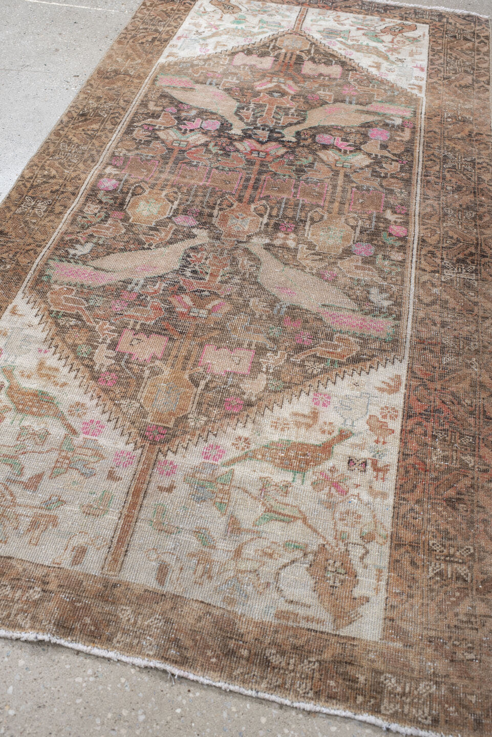 2' x 4' one-of-a-kind handmade vintage Belouch small size rug. Color palette: brown, ivory, camel, rose, aqua, taupe