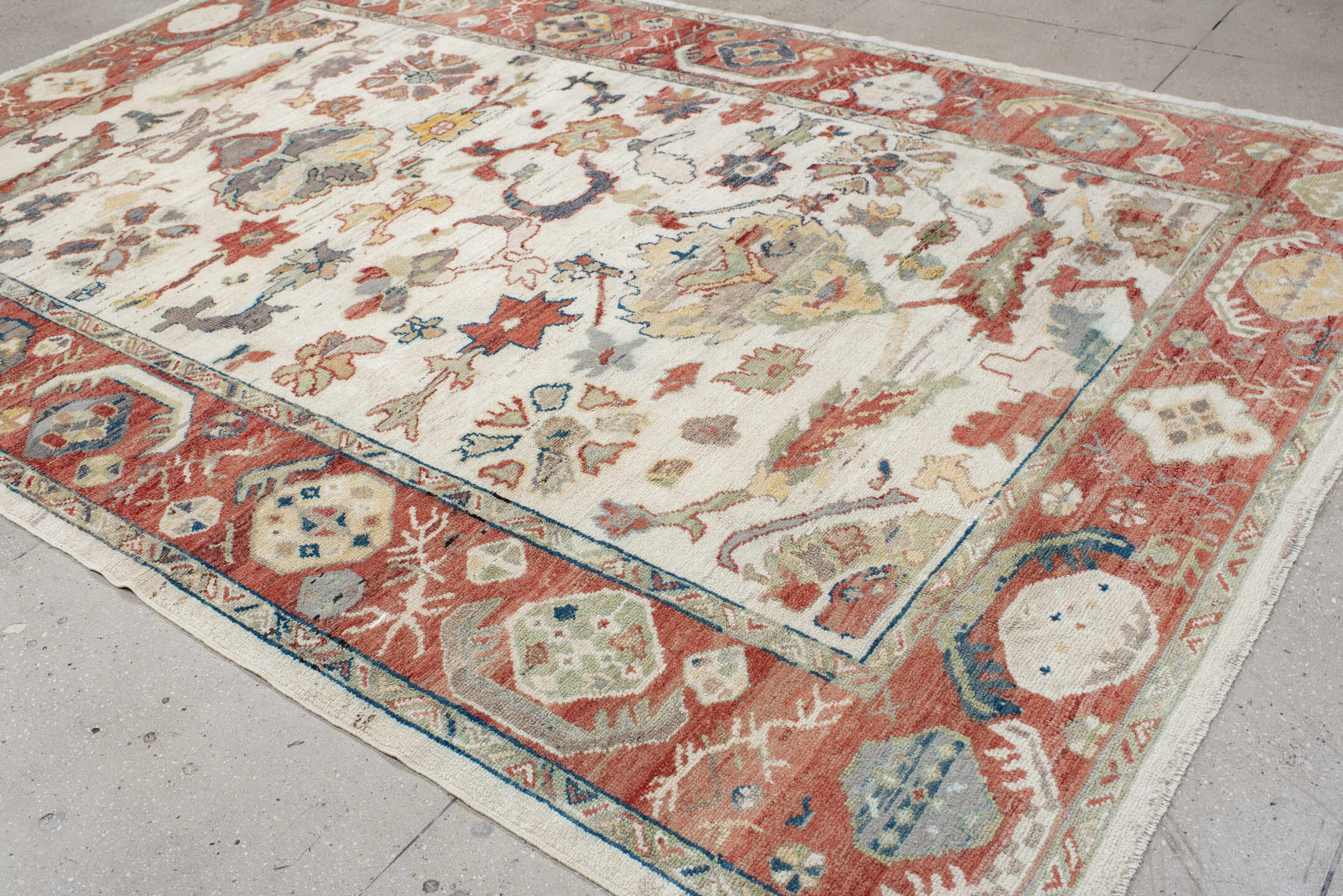 8' x 12' one-of-a-kind handmade vintage Oushak large size rug. Color palette: ivory, rust, sage, slate_blue, gold, coral