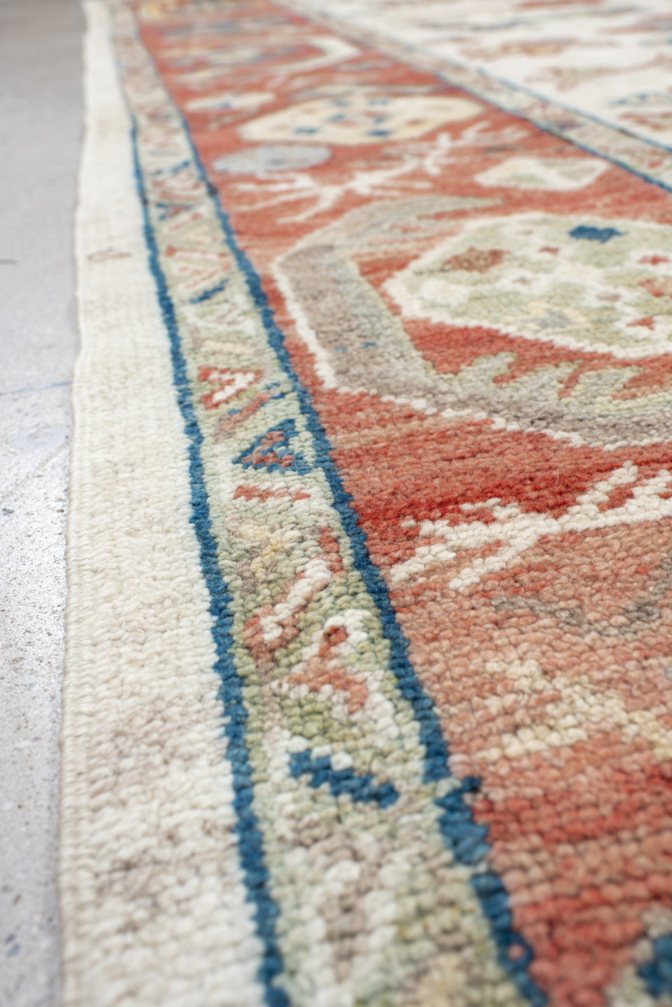 8' x 12' one-of-a-kind handmade vintage Oushak large size rug. Color palette: ivory, rust, sage, slate_blue, gold, coral