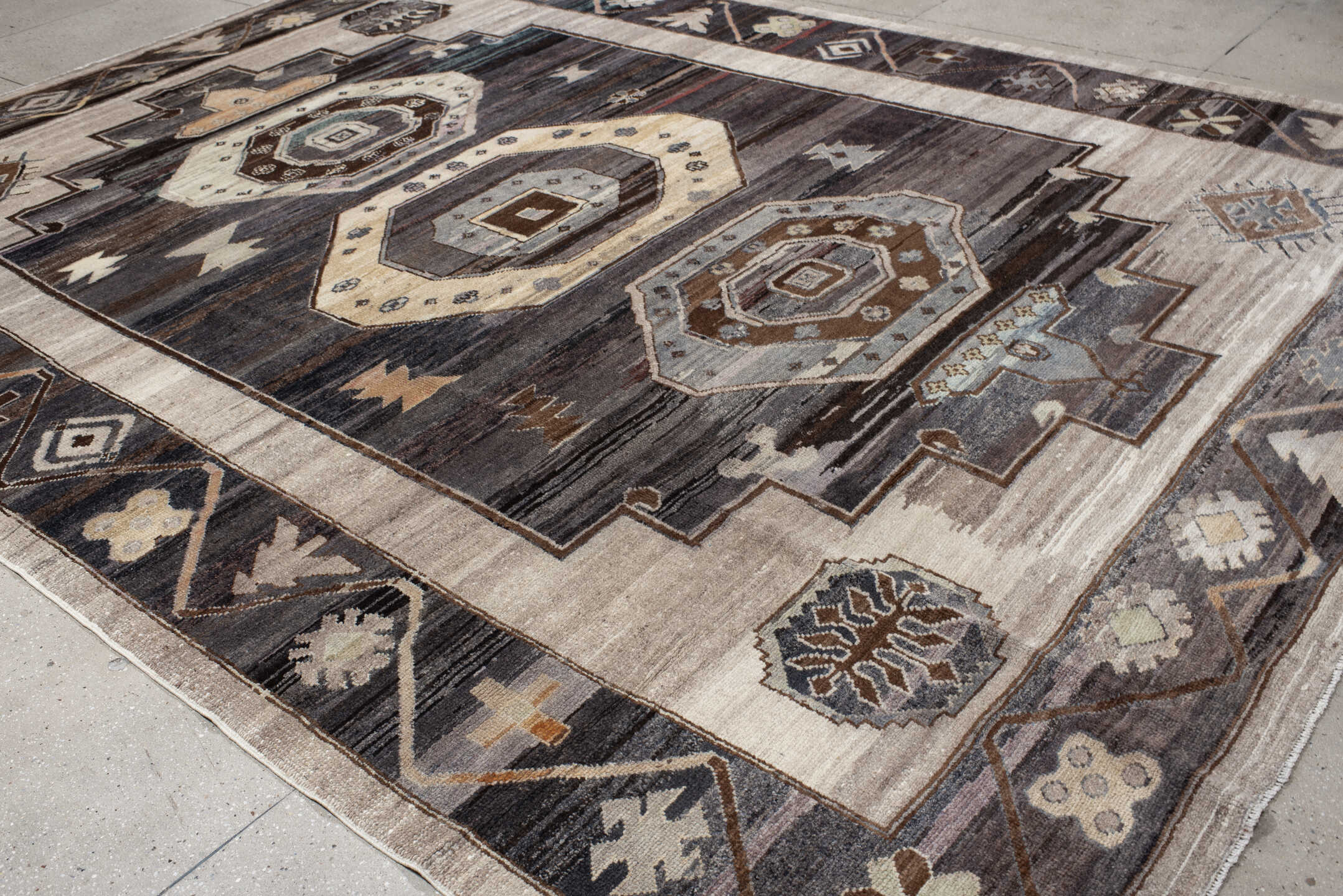 10' x 13' one-of-a-kind handmade vintage Kars large size rug. Color palette: ivory, charcoal, taupe, brown, slate, camel