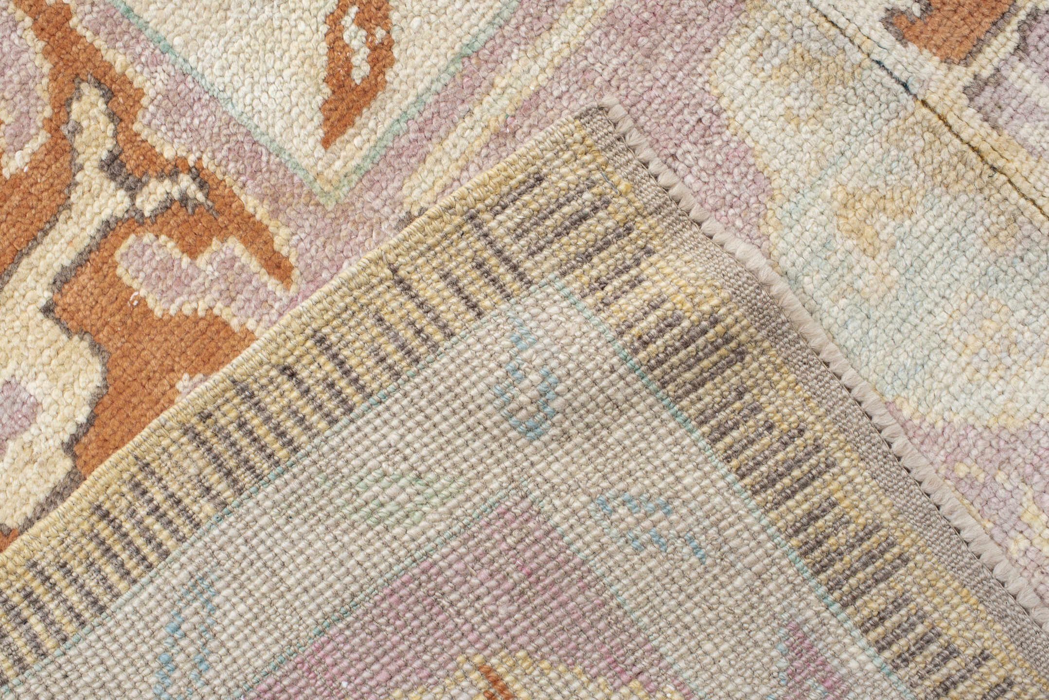 9' x 11' one-of-a-kind handmade vintage Oushak large size rug. Color palette: ivory, lavender, peach, pale gold, sky blue