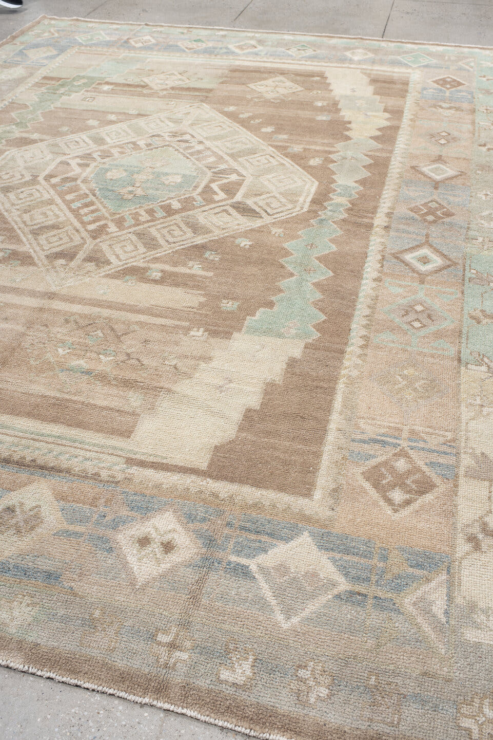 9' x 12' one-of-a-kind handmade vintage Oushak large size rug. Color palette: taupe, ivory, aqua, beige, sand, pale blue