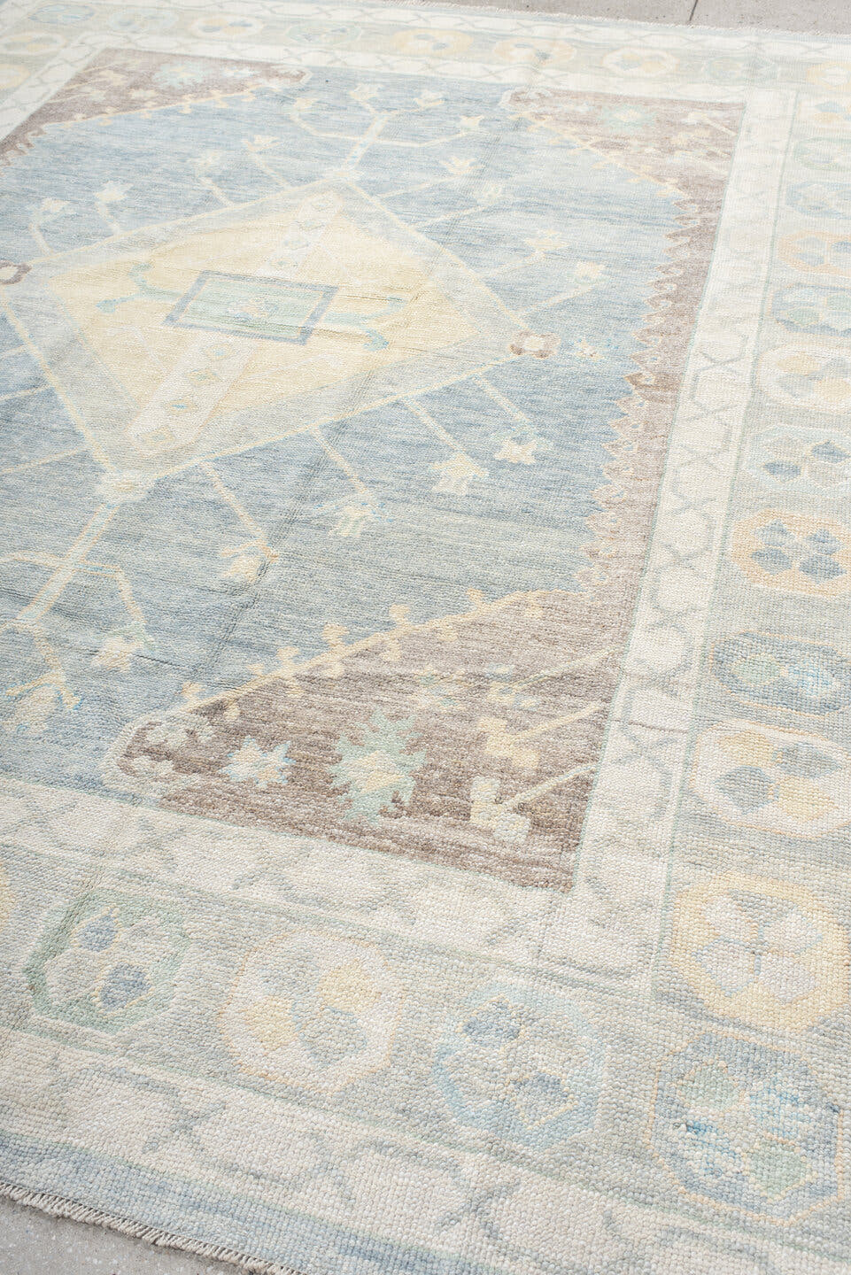 8' x 10' one-of-a-kind handmade vintage Oushak large size rug. Color palette: pale blue, ivory, cream, taupe, beige