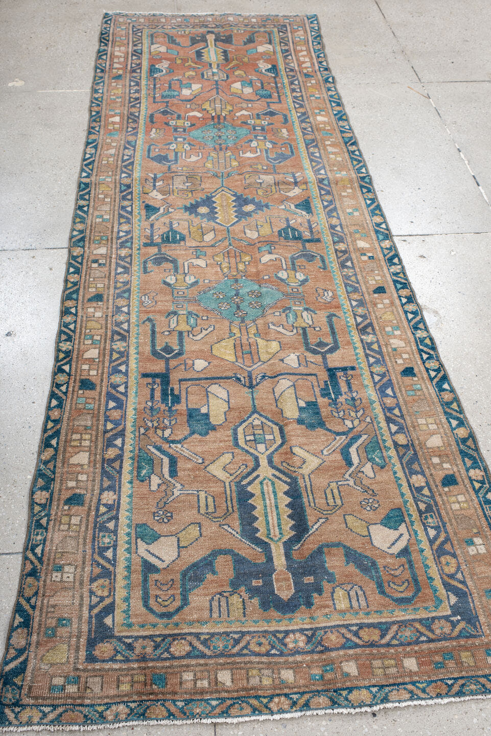 3' x 9' one-of-a-kind handmade vintage Lilian runner rug. Color palette: rose, teal, ivory, navy, camel, sage, taupe, pink