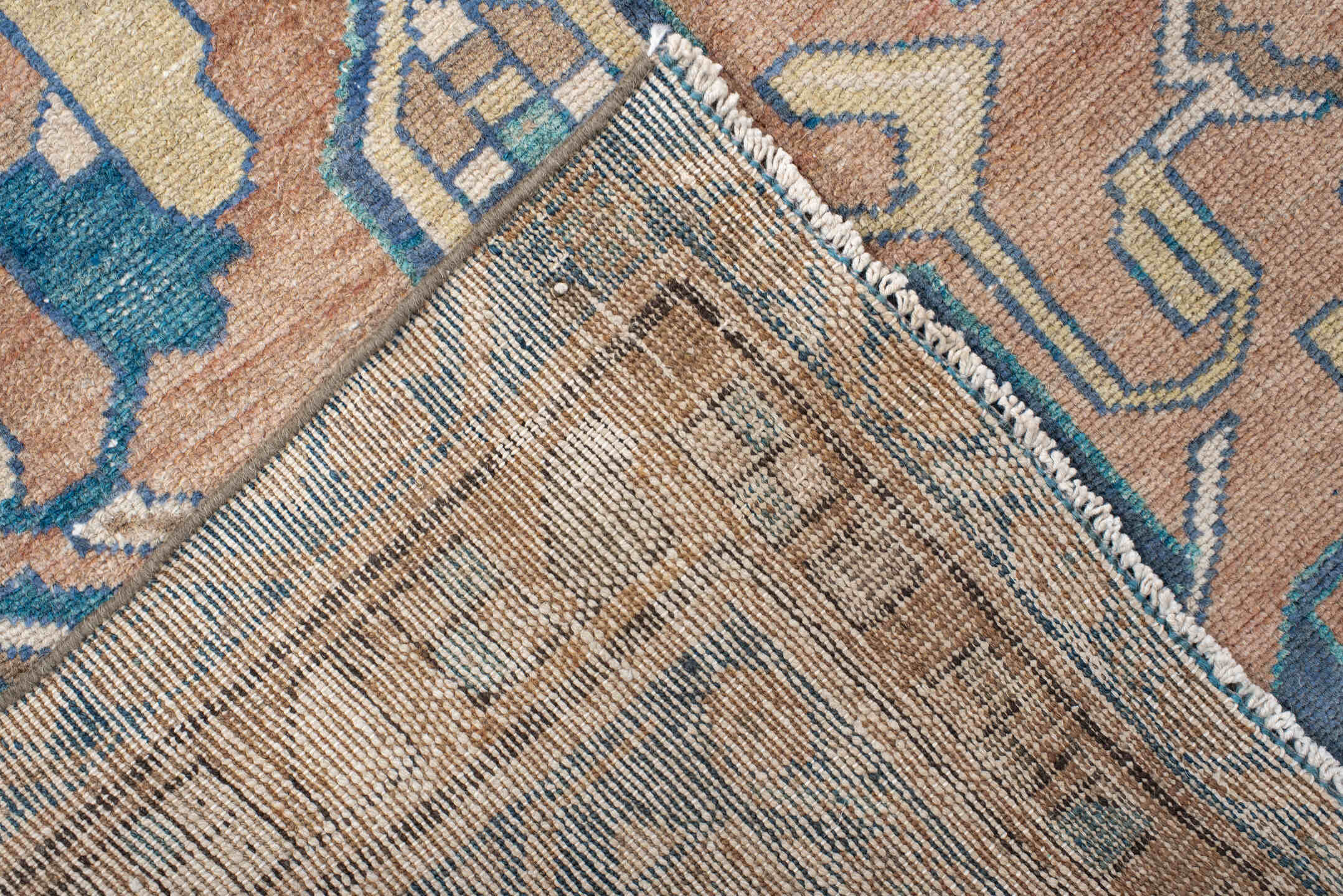 3' x 9' one-of-a-kind handmade vintage Lilian runner rug. Color palette: rose, teal, ivory, navy, camel, sage, taupe, pink