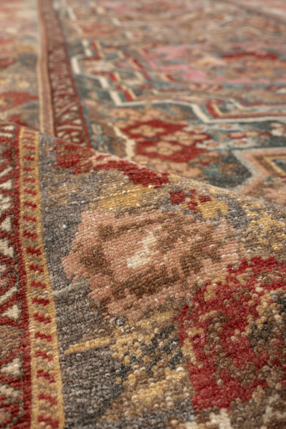 4' x 11' one-of-a-kind handmade vintage Baktiary runner rug. Color palette: ivory, rose, rust, slate, burgundy, taupe, sage