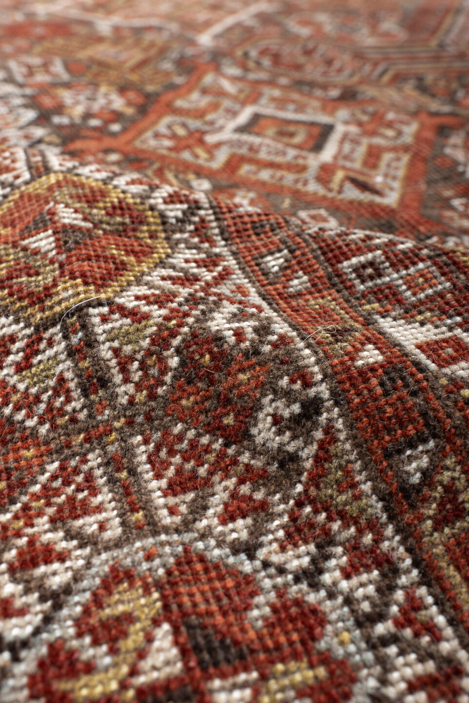 7' x 10' one-of-a-kind handmade antique Shiraz large size rug. Color palette: rust, ivory, brown, terra cotta, charcoal